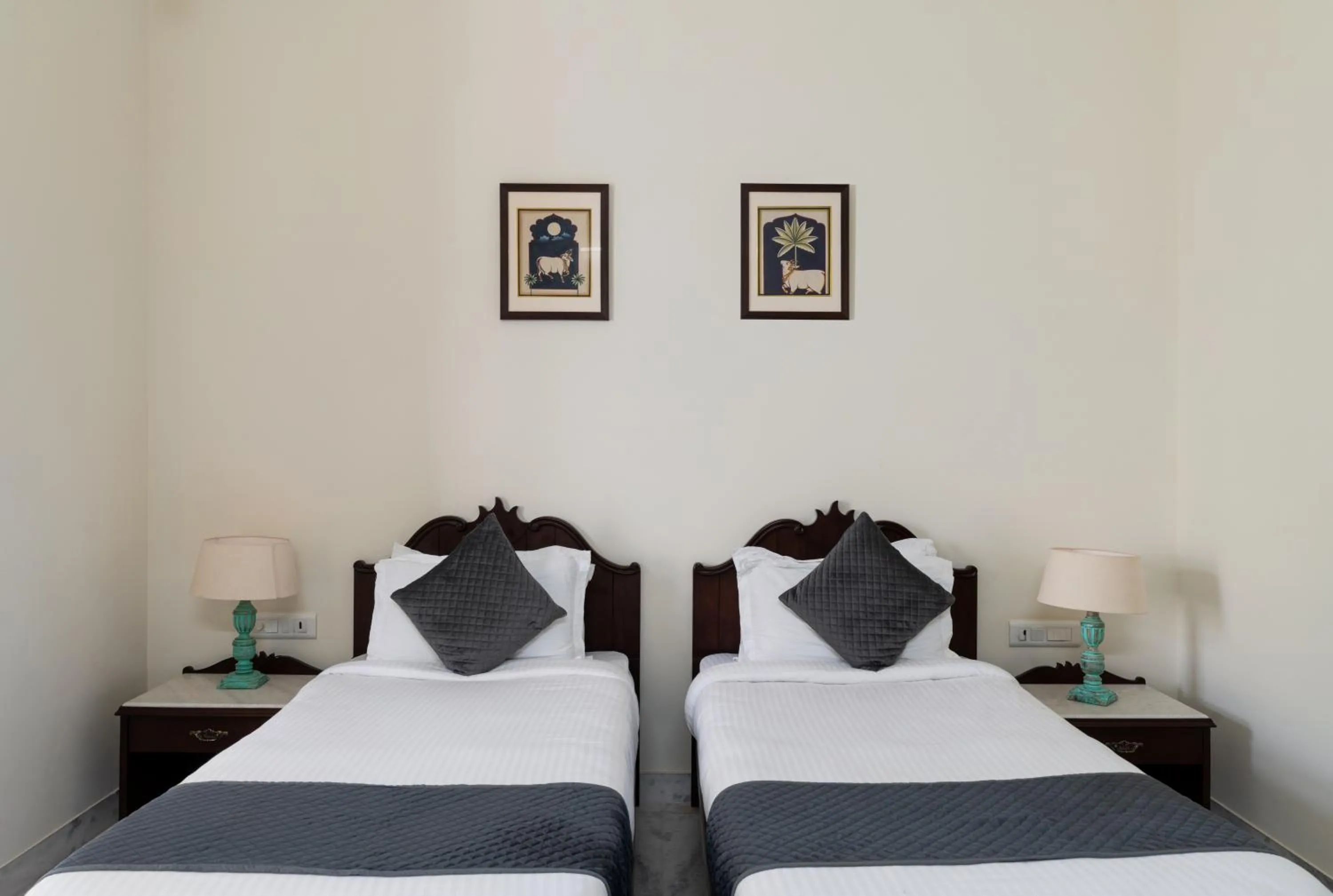 Bed in Chandra Vilas Heritage stay