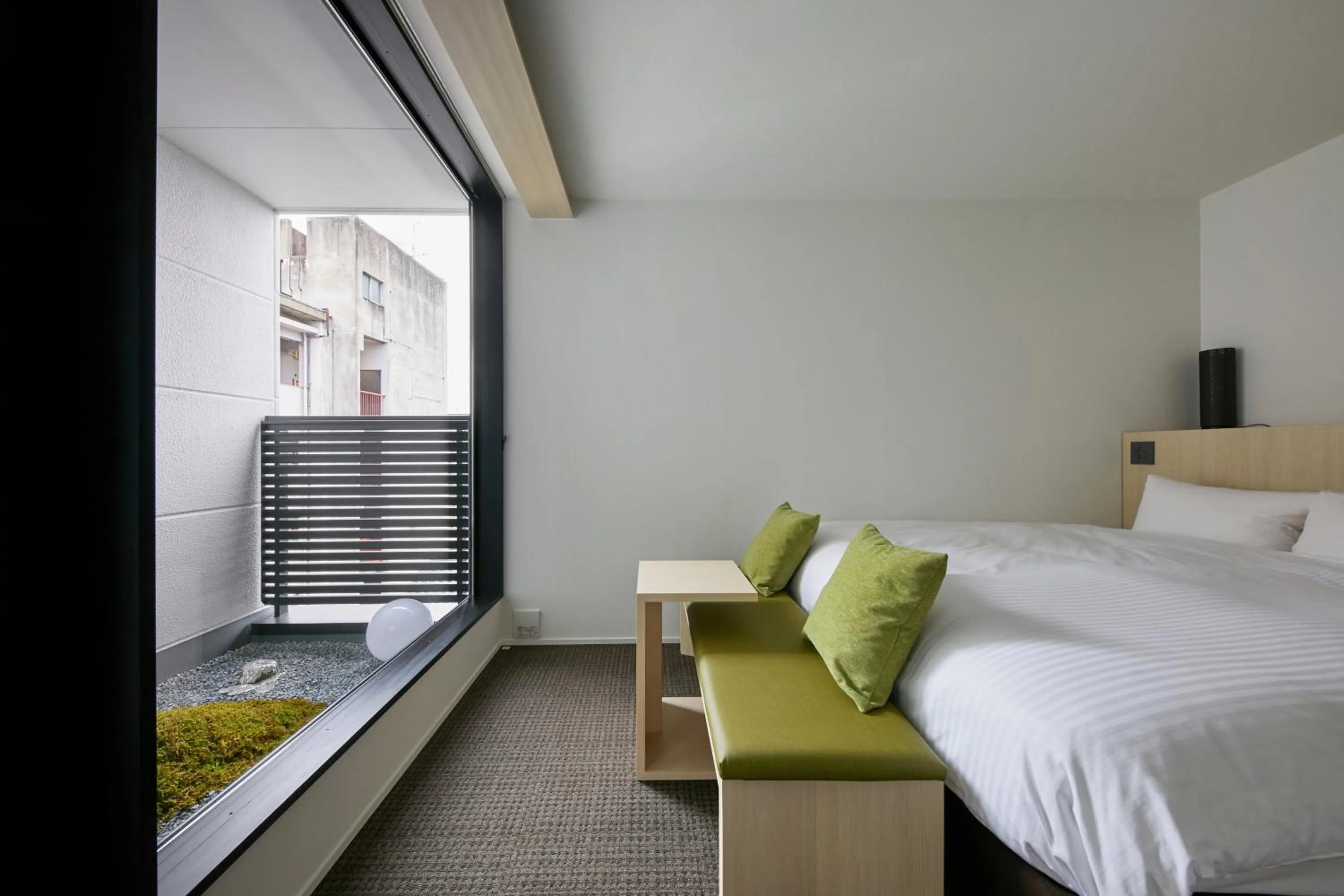 Bed in HOTEL KYOTOLOGY