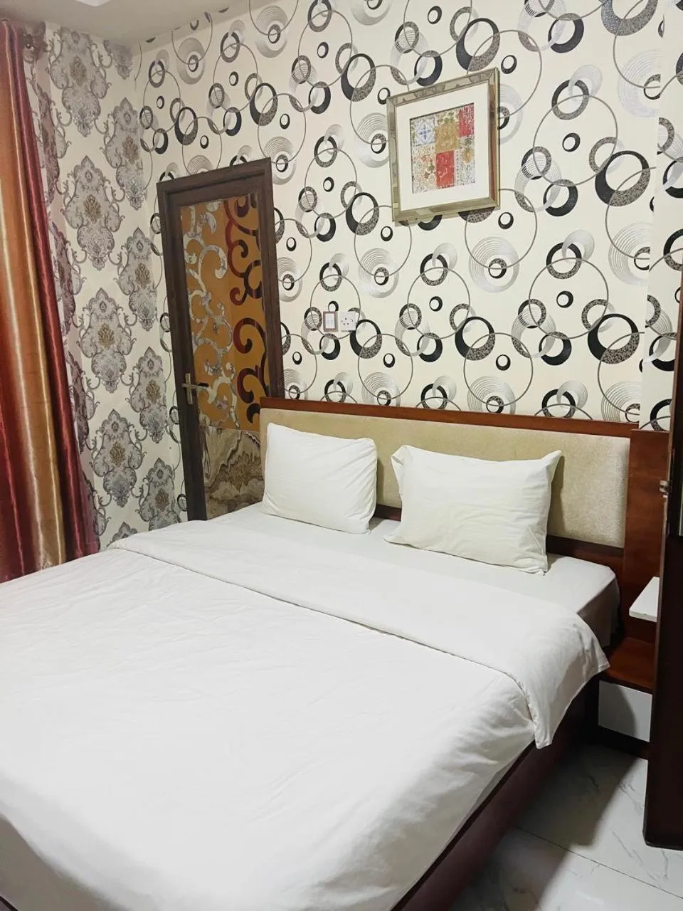 Bed in Grand Inn Hotel