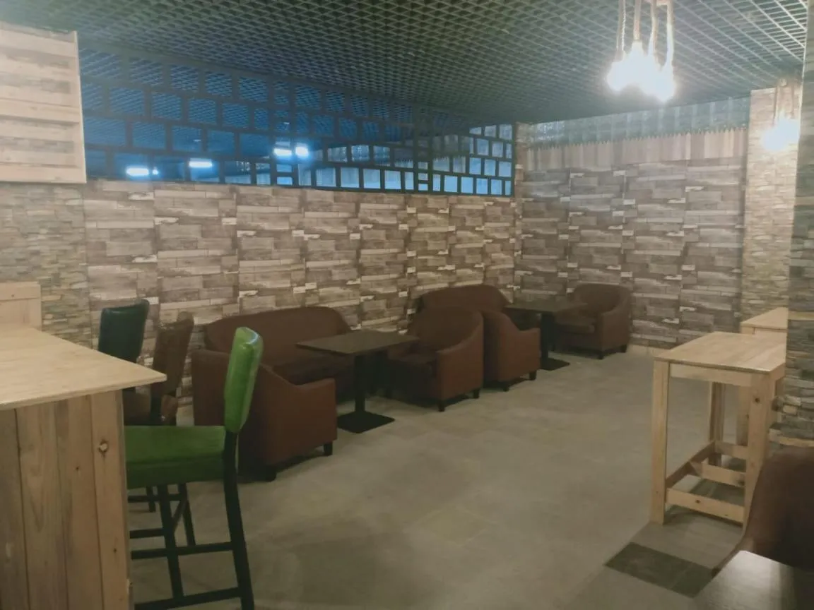 Lounge or bar in Grand Inn Hotel