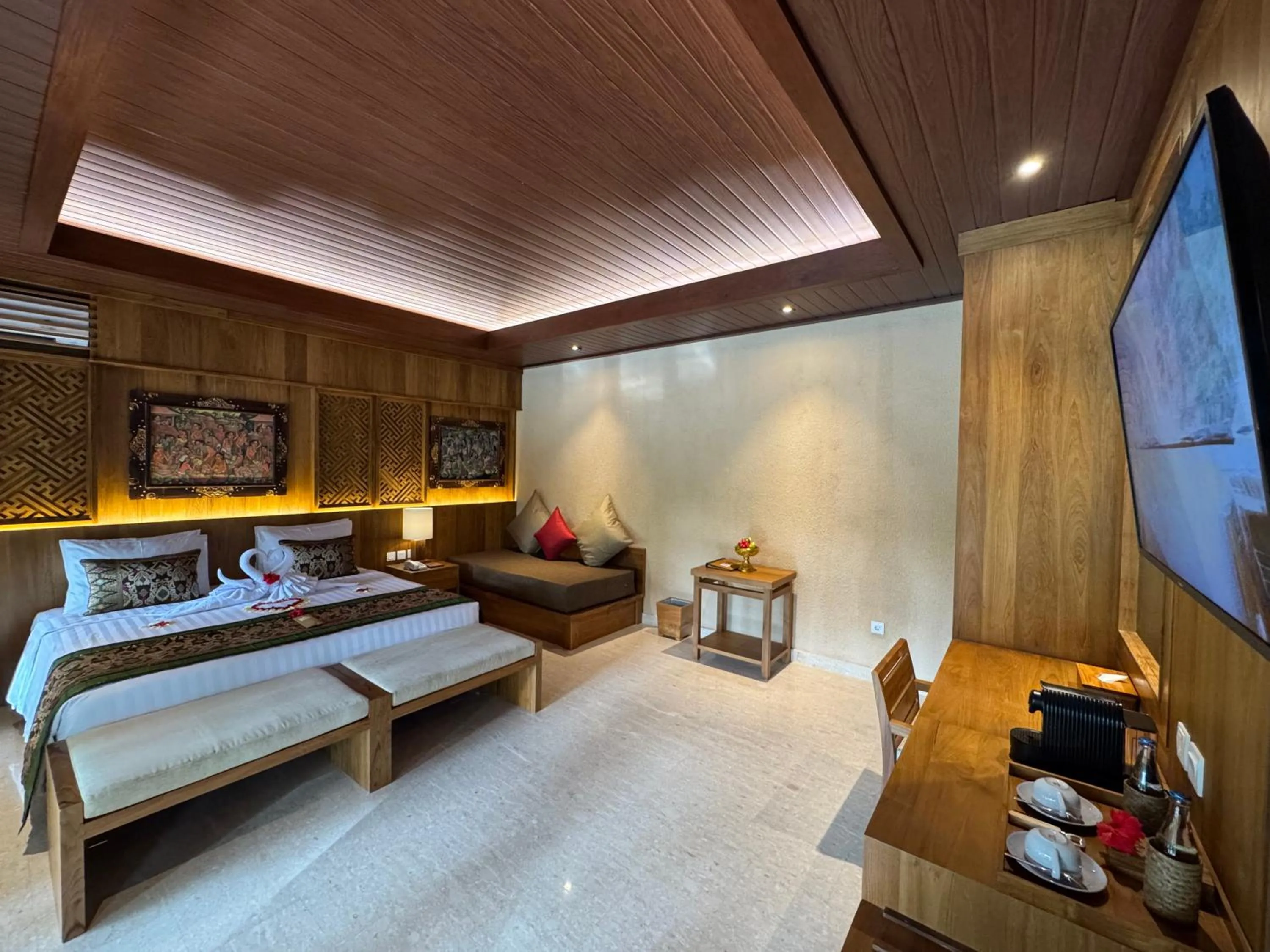 Bed in Sakti Garden Resort & Spa