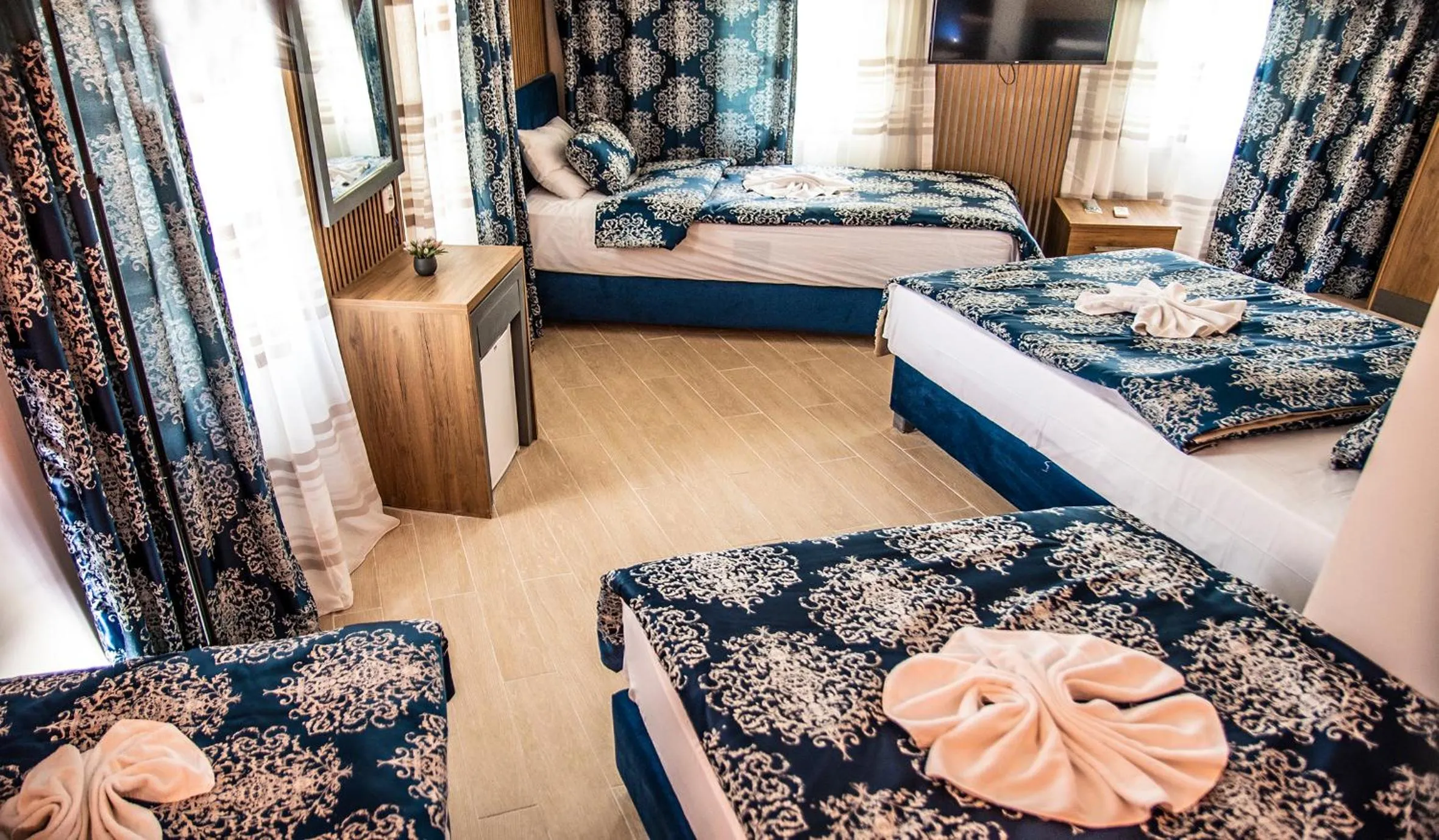 Bed in Blue Bay Beach Hotel