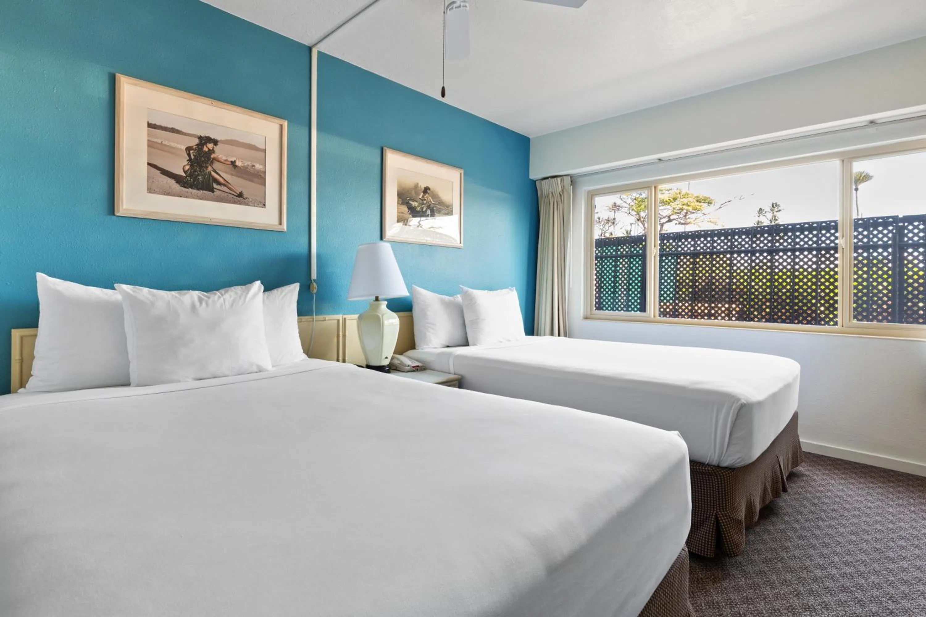 Bed in Maui Seaside Hotel