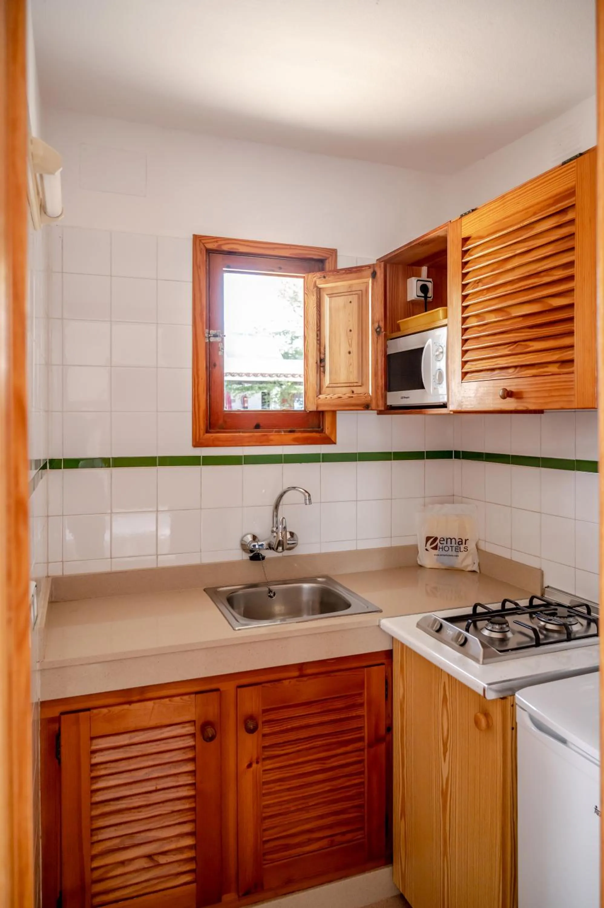 kitchen in Bungalows Es Pins - Emar Hotels