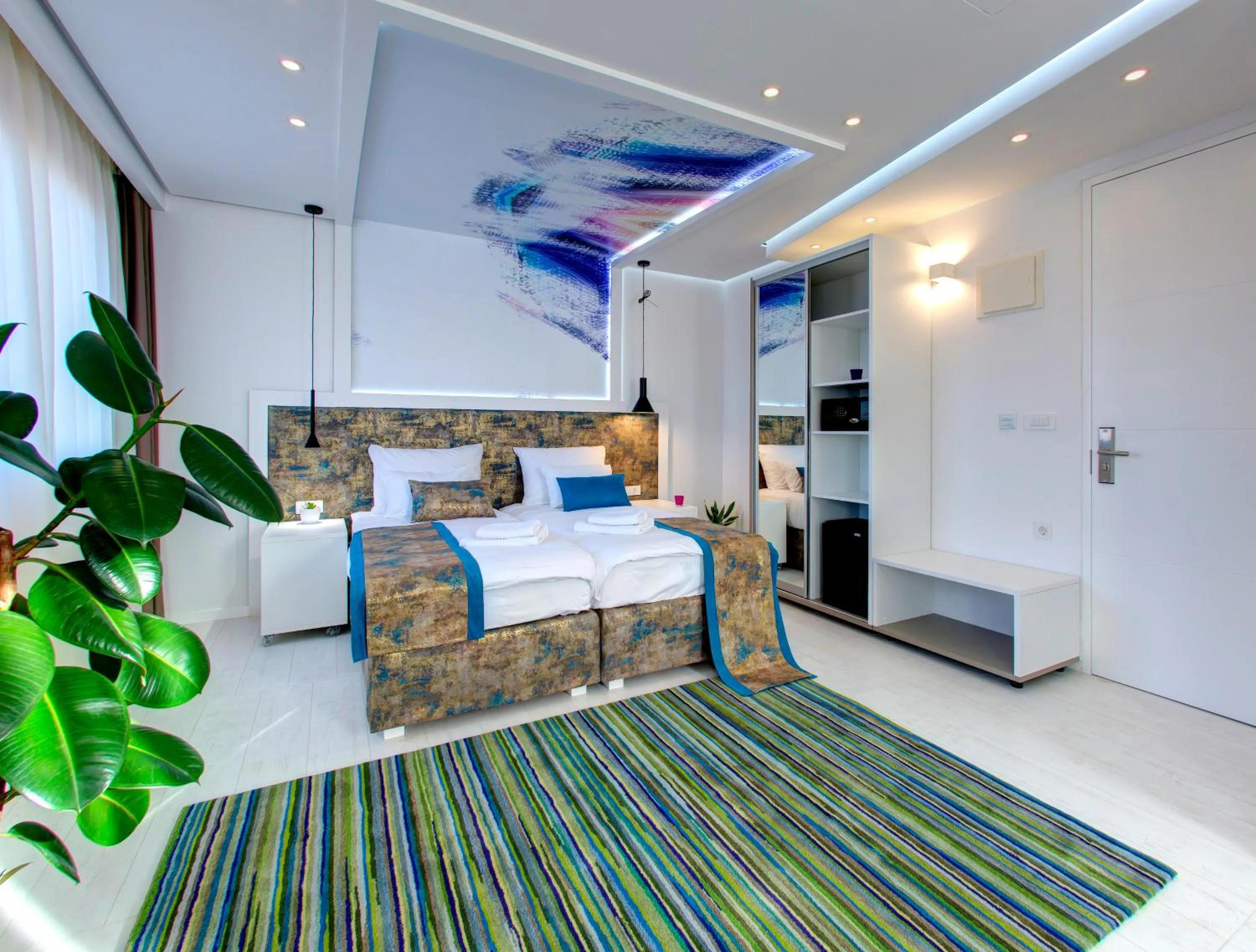 Bed in Diamond Rain Boutique Hotel