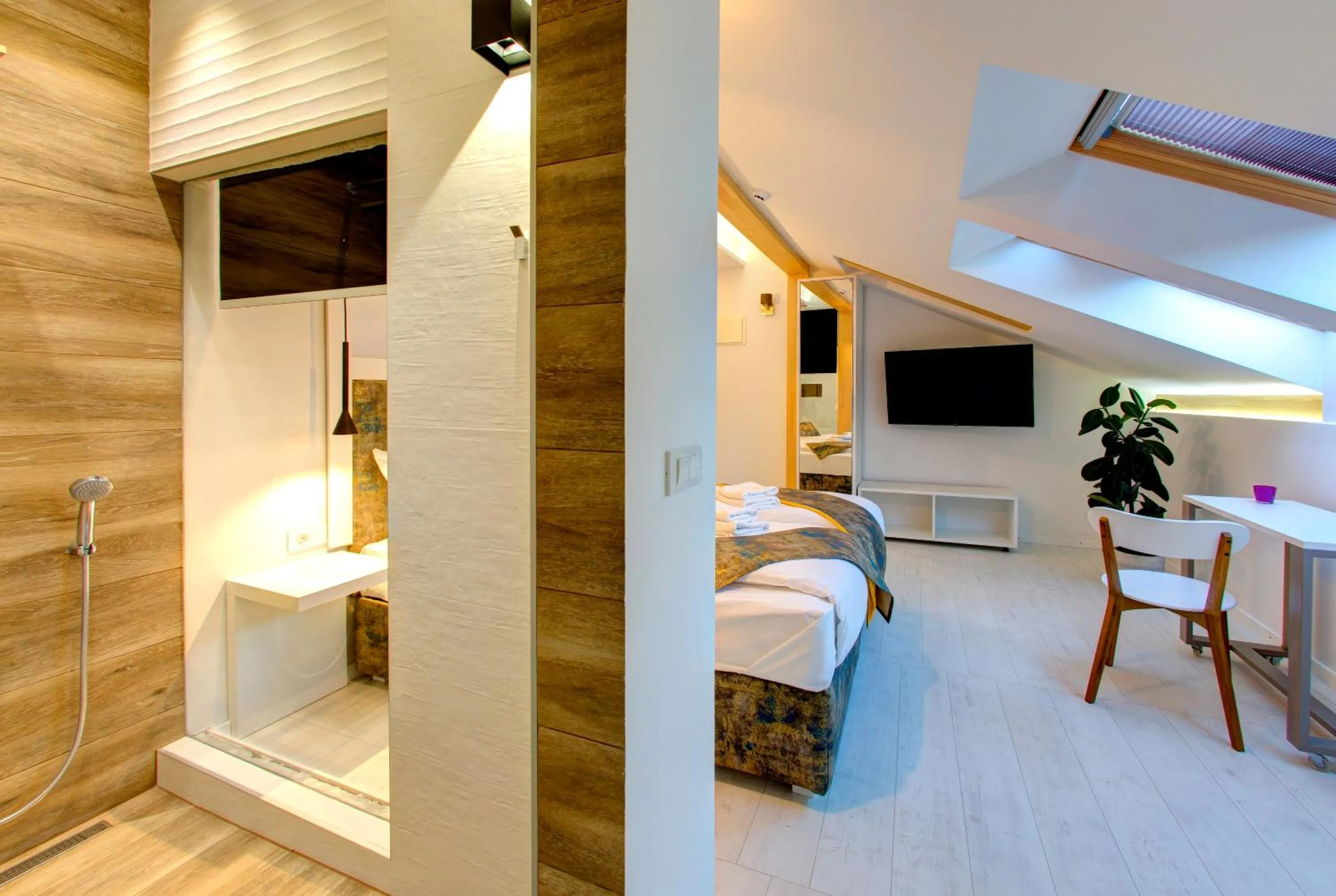 Bed in Diamond Rain Boutique Hotel