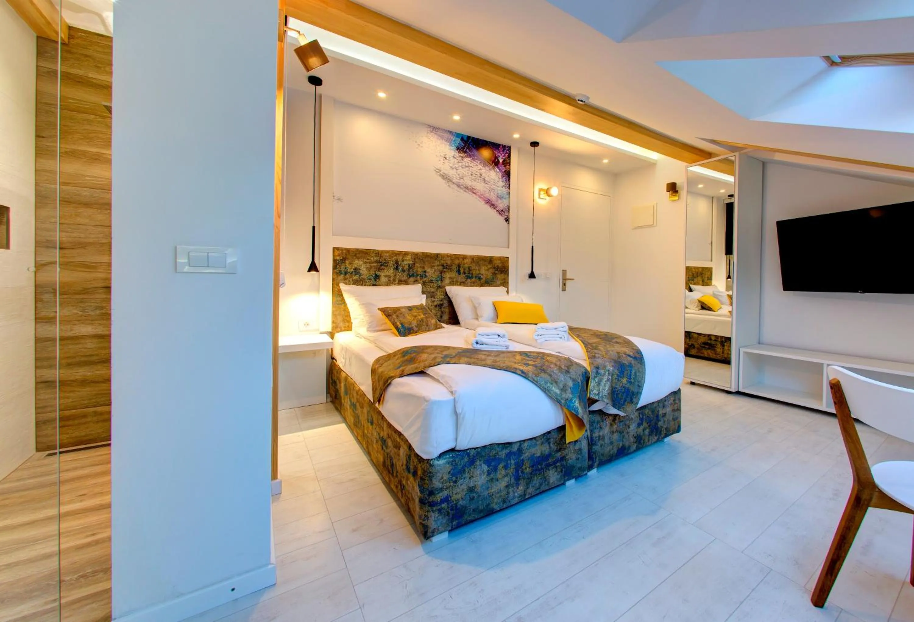 Bed in Diamond Rain Boutique Hotel