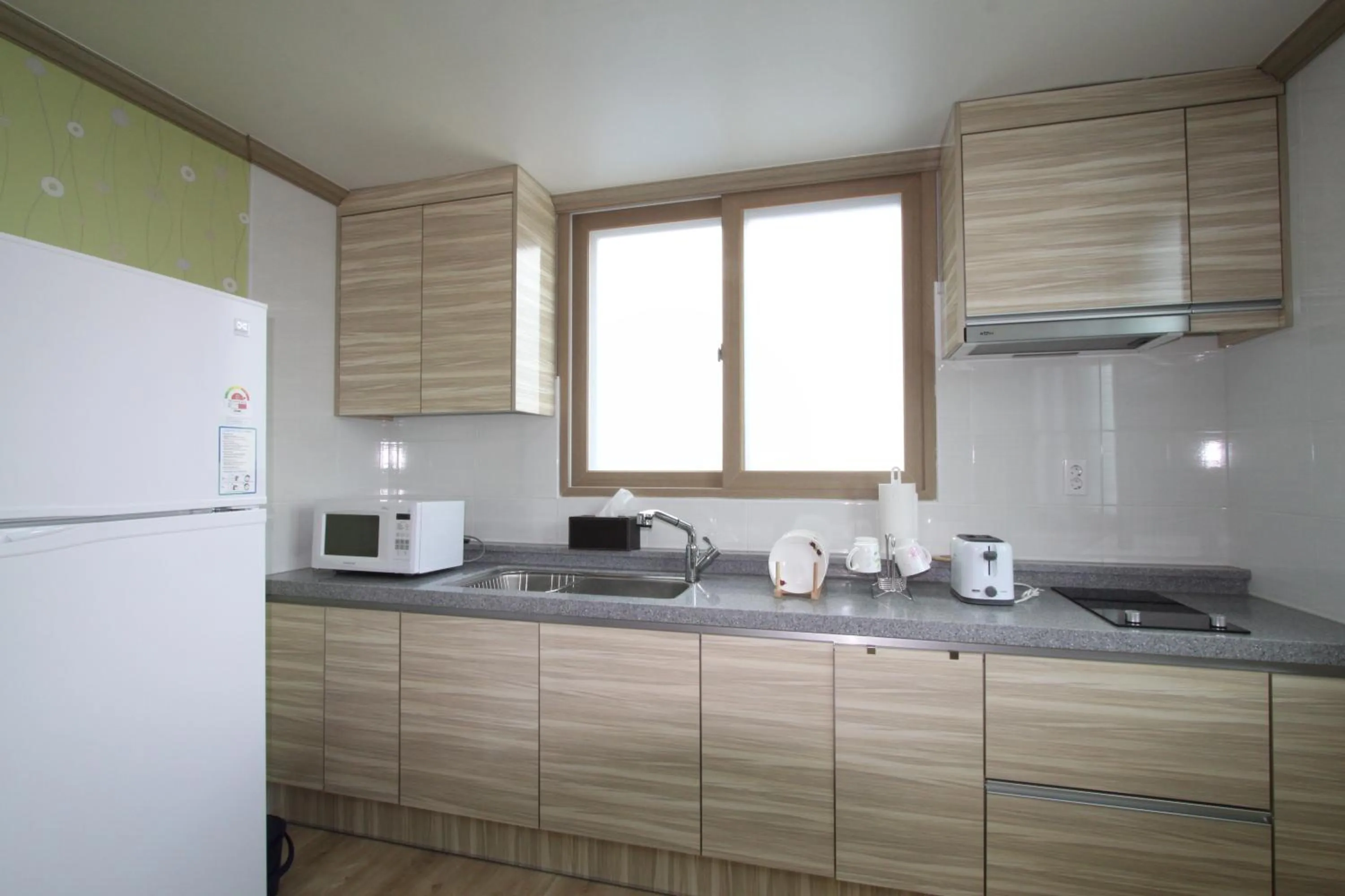 Kitchen or kitchenette in Hostel Dahyun & Guesthouse