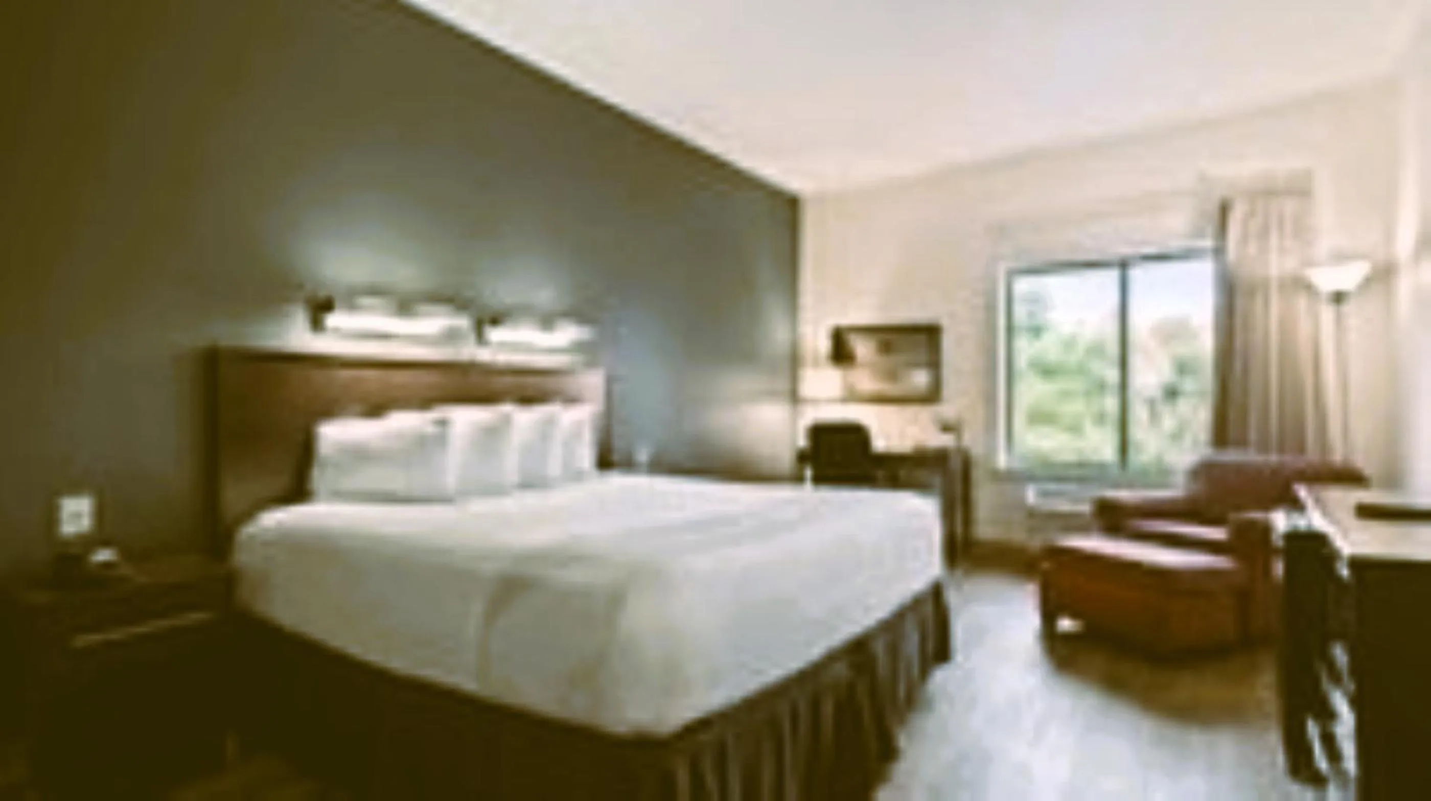 Bedroom, Bed in Suburban Studios Orlando - Ocoee-Winter Garden