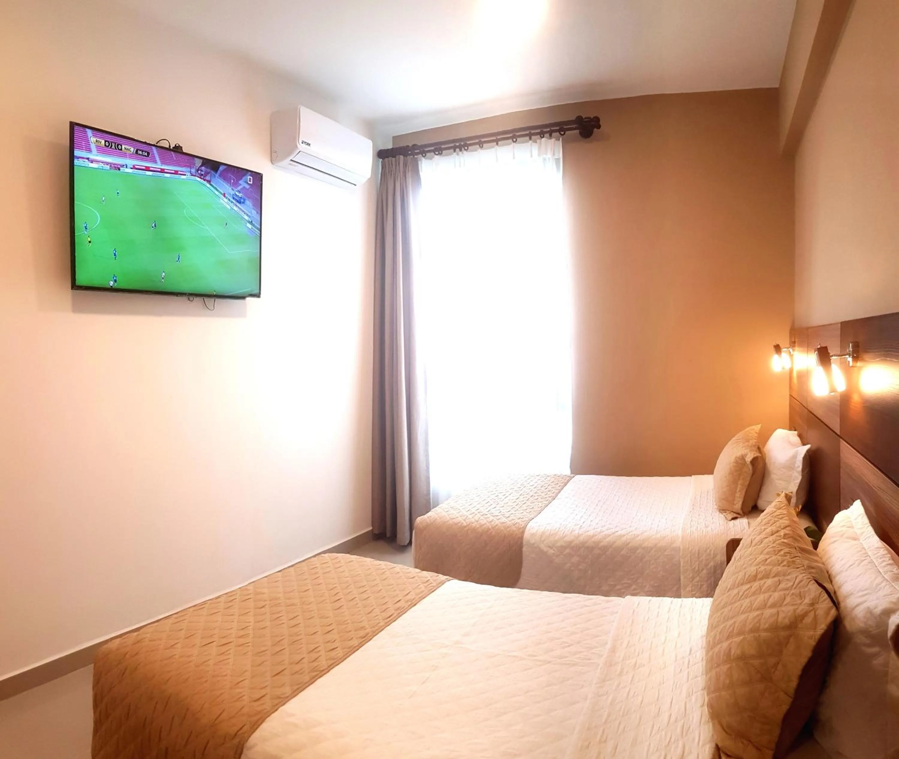 Bed in Premium Suites Deluxe Aparthotel Equipetrol