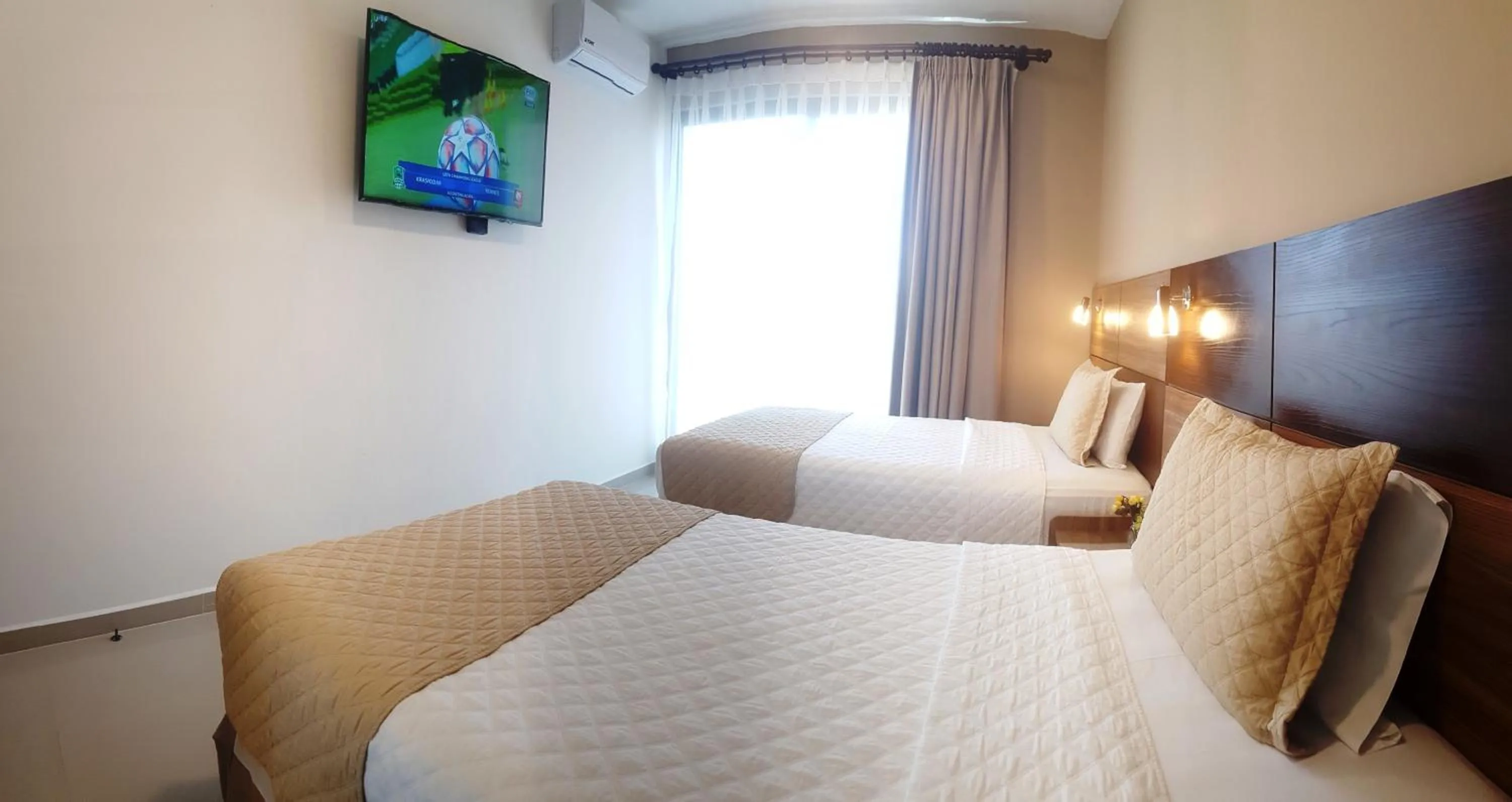 Bed in Premium Suites Deluxe Aparthotel Equipetrol