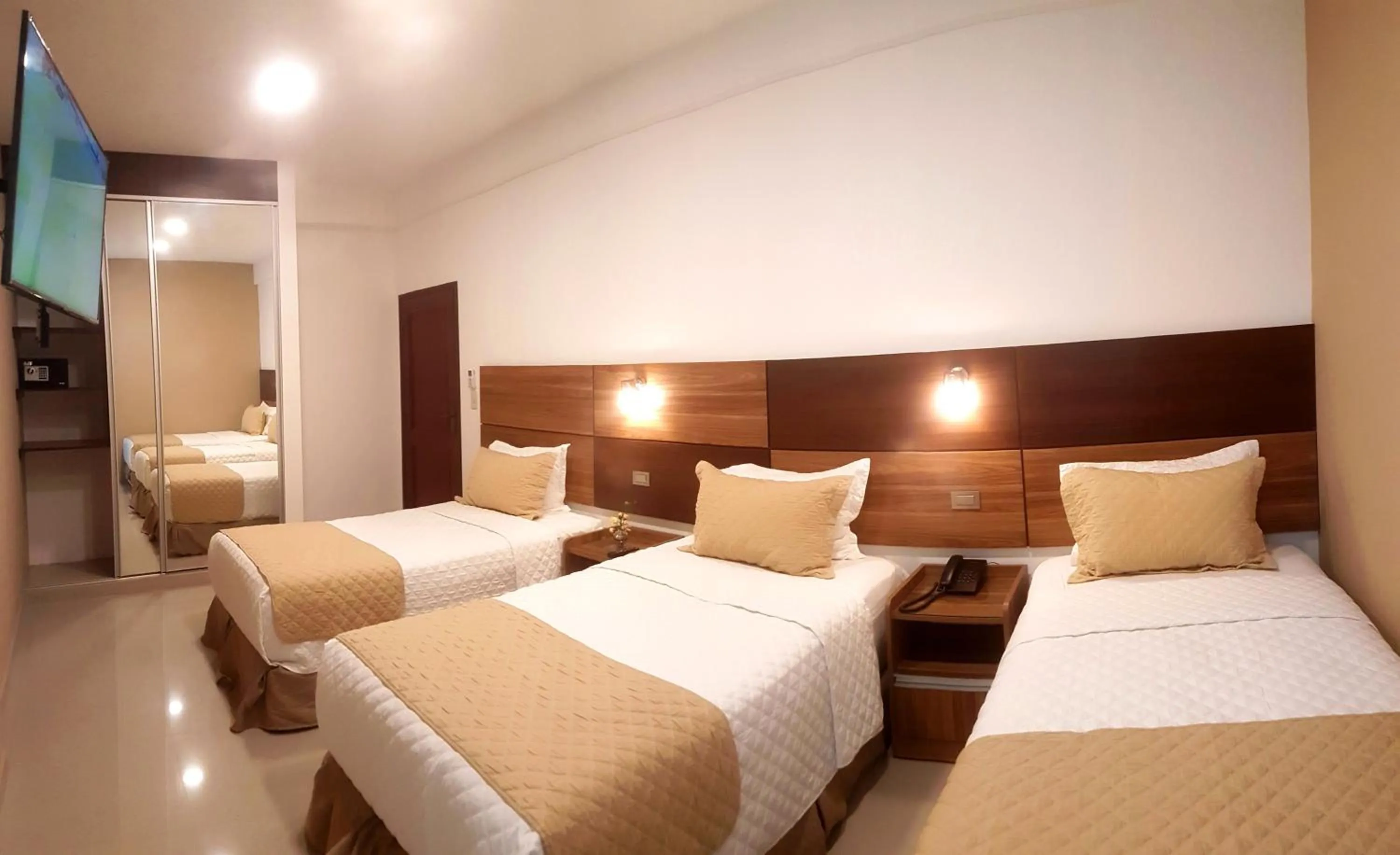 Bed in Premium Suites Deluxe Aparthotel Equipetrol