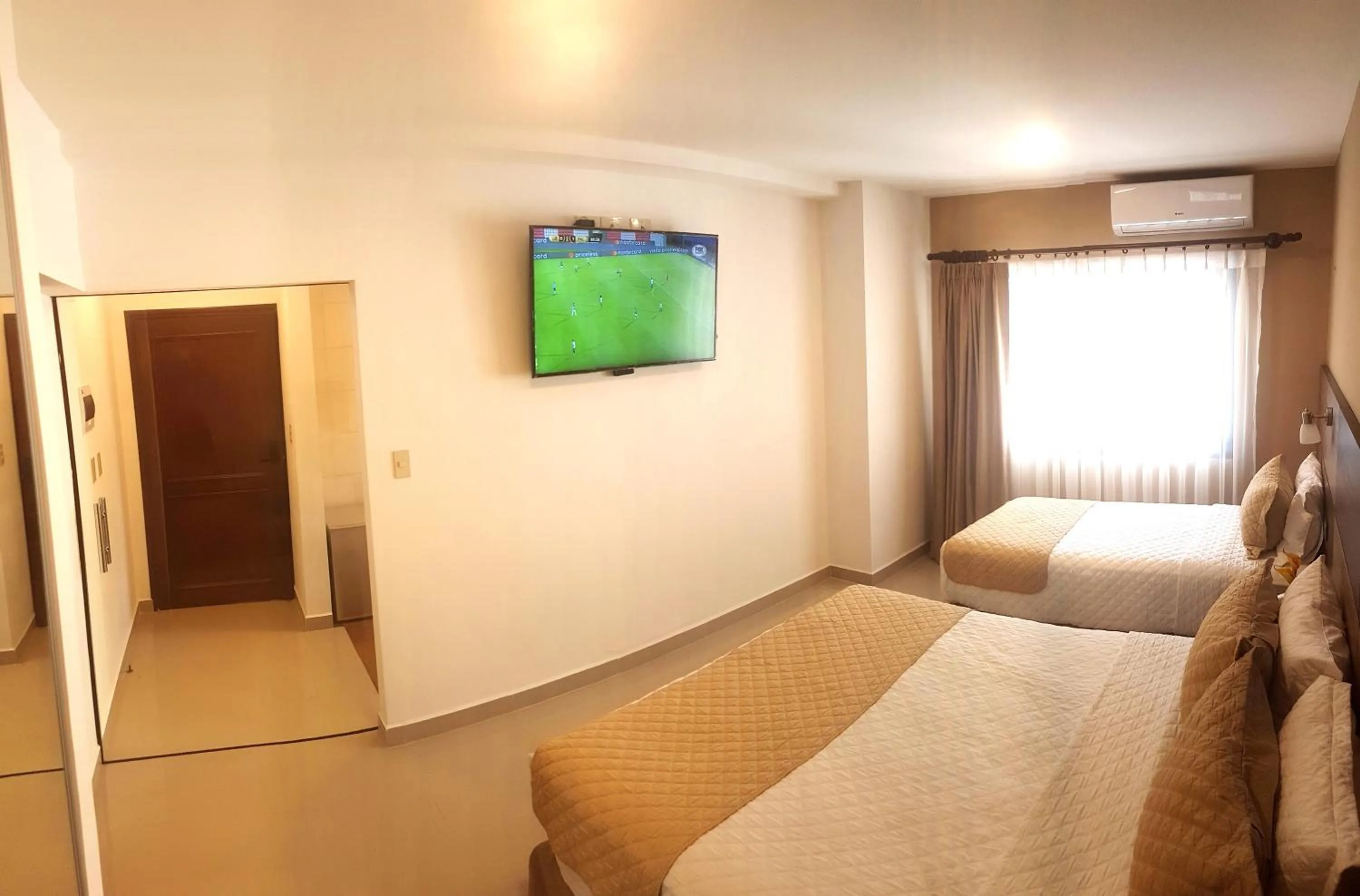 Bed in Premium Suites Deluxe Aparthotel Equipetrol