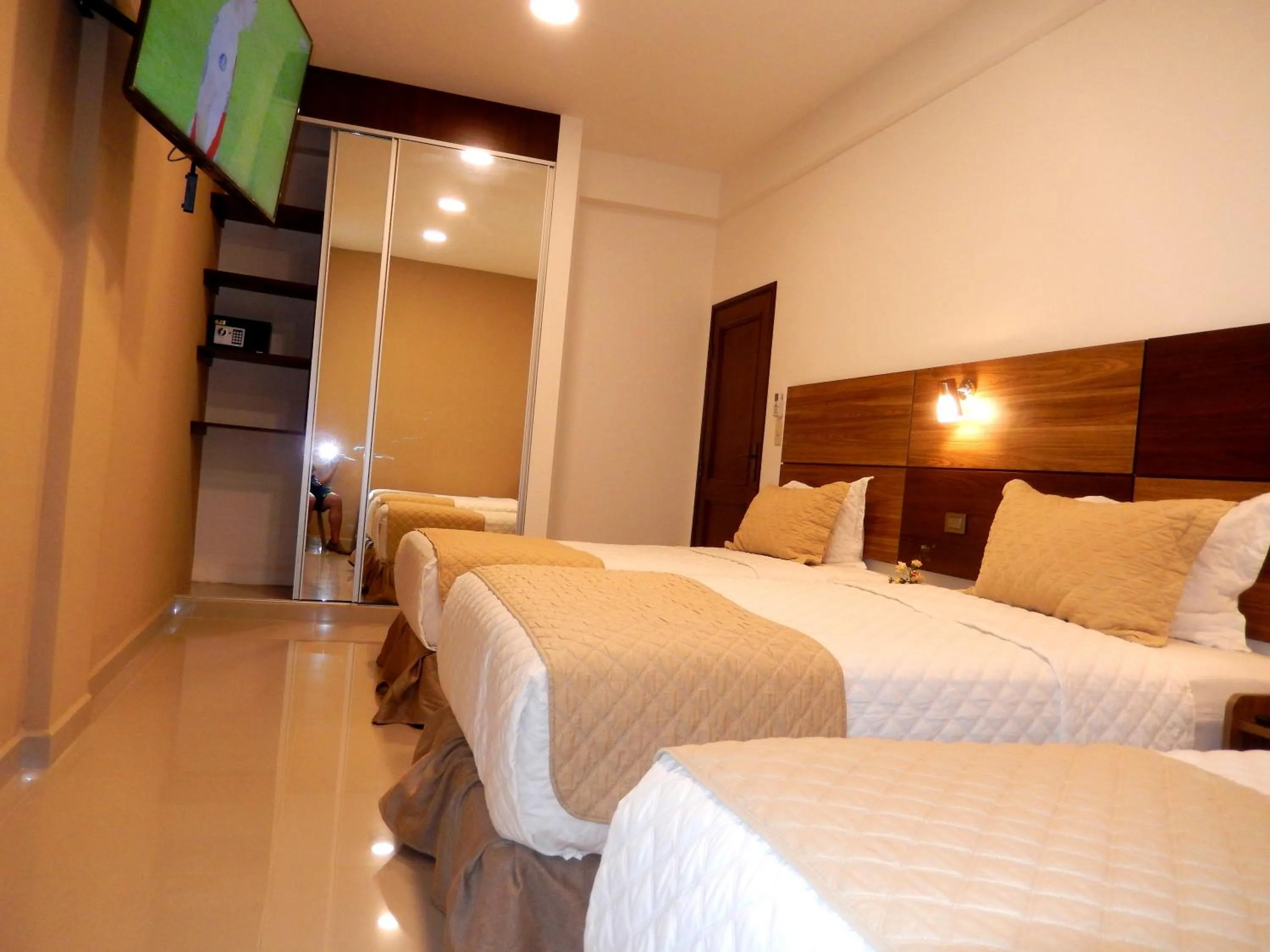 Bed in Premium Suites Deluxe Aparthotel Equipetrol