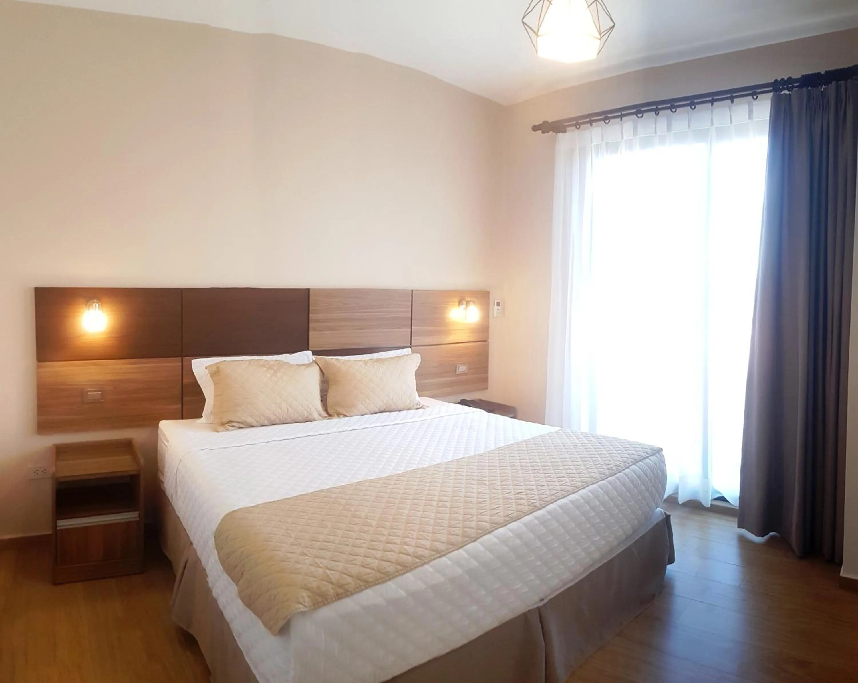 Bed in Premium Suites Deluxe Aparthotel Equipetrol