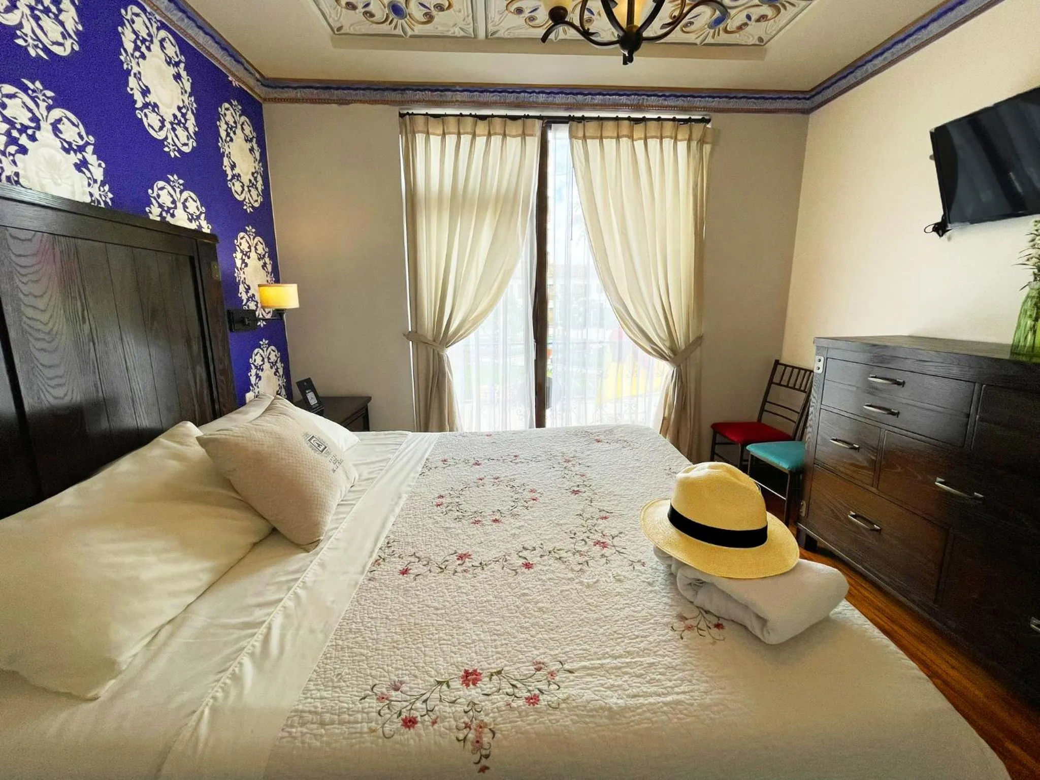 Bed in Hotel Azul de la Plaza by Chat Noir