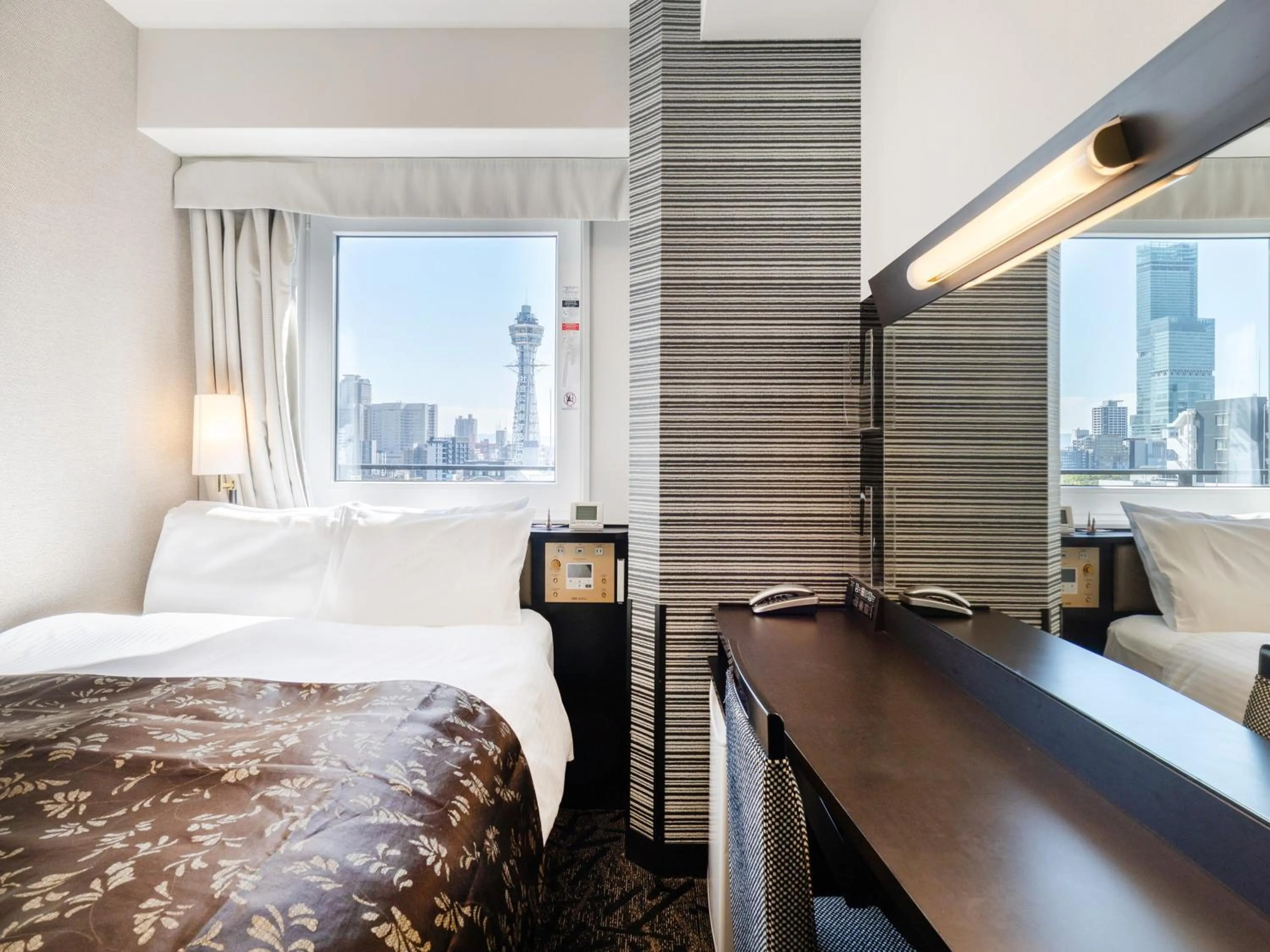 Bed in APA Hotel Nambaminami Ebisucho Eki Shinsekai