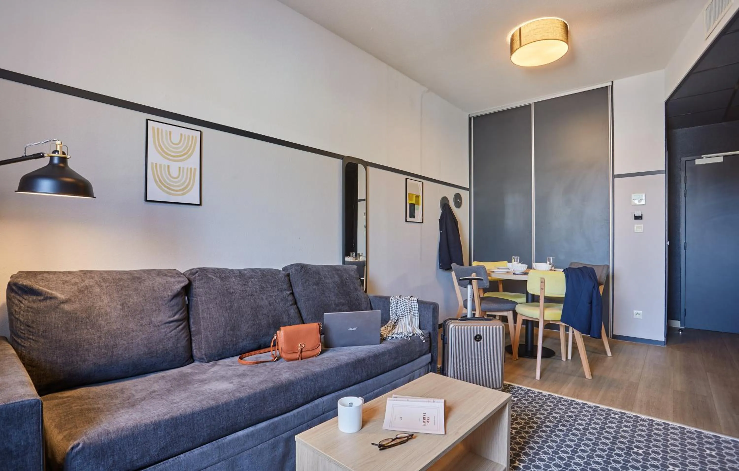 Seating area in Appart'hôtel Odalys City - Bioparc Lyon Est