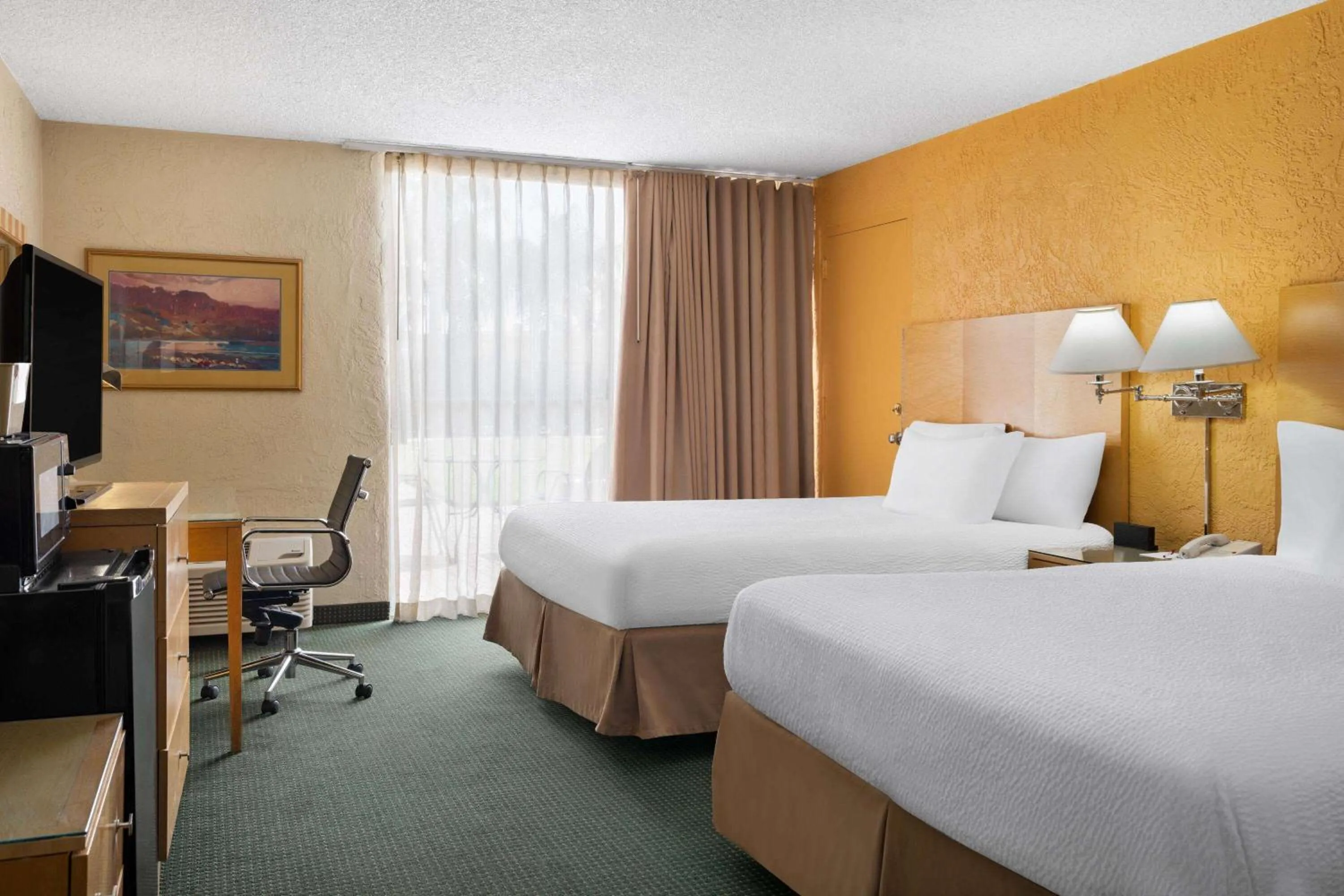 Photo of the whole room, Bed in Ramada by Wyndham Tucson