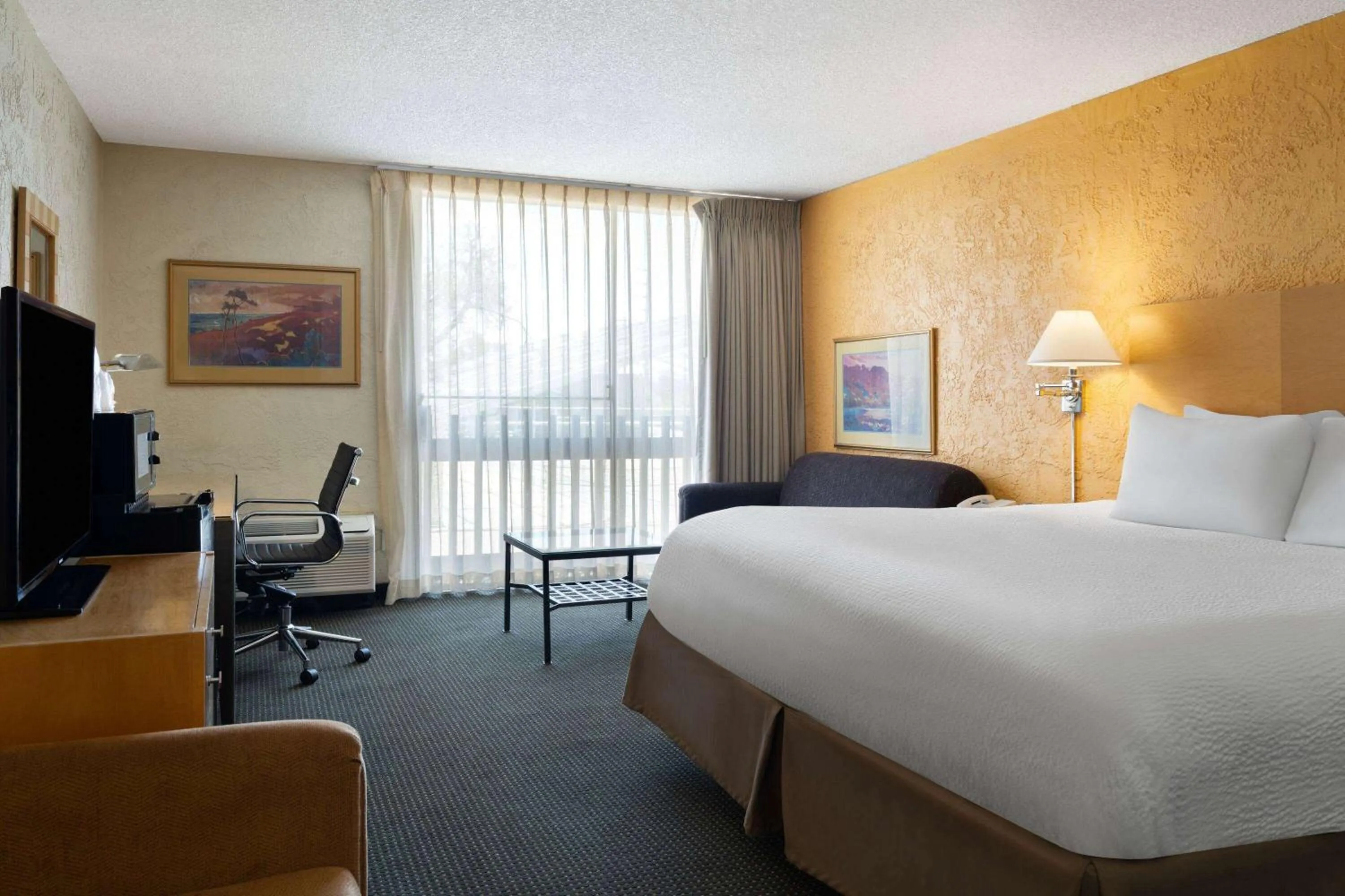 Photo of the whole room, Bed in Ramada by Wyndham Tucson