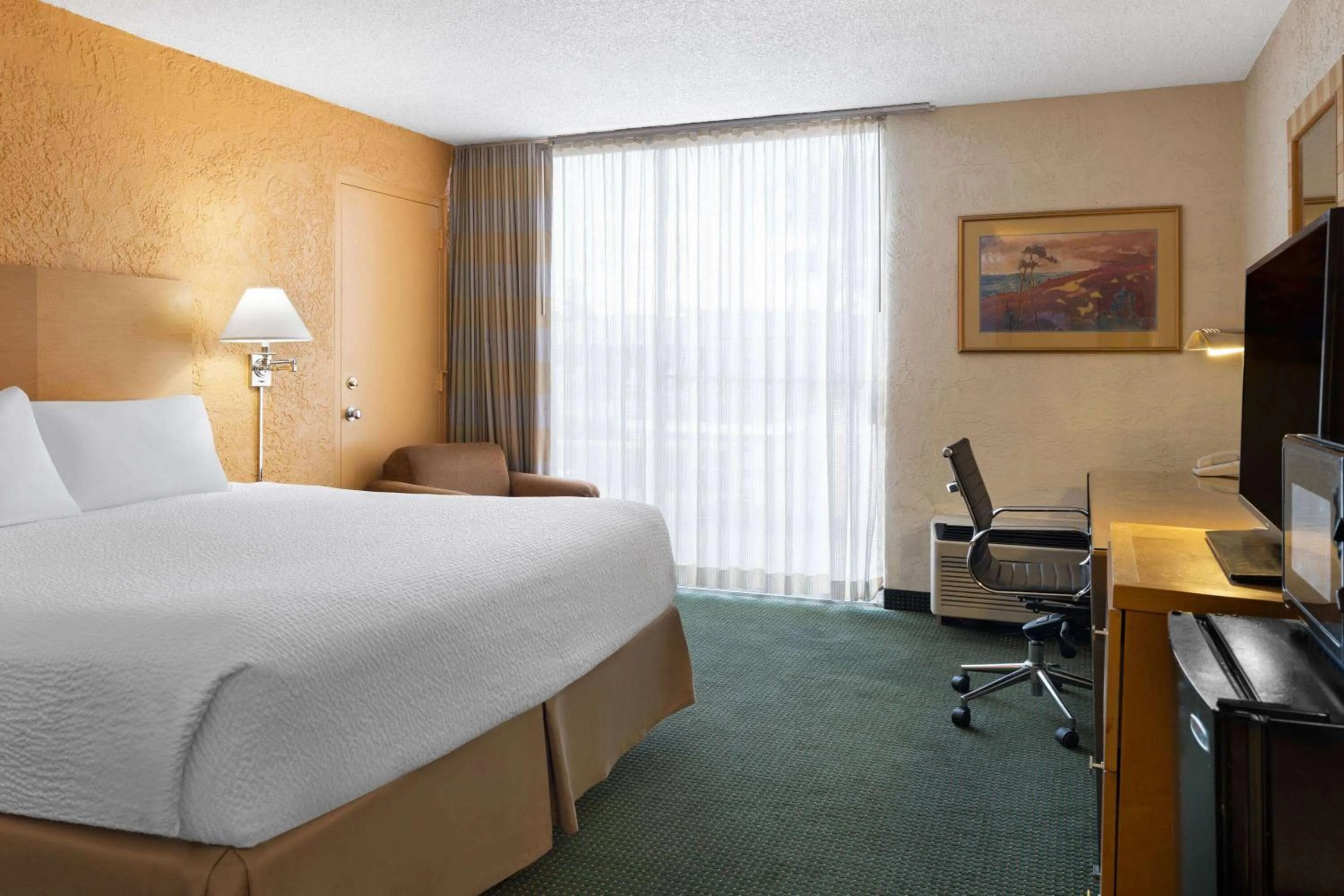 Photo of the whole room, Bed in Ramada by Wyndham Tucson