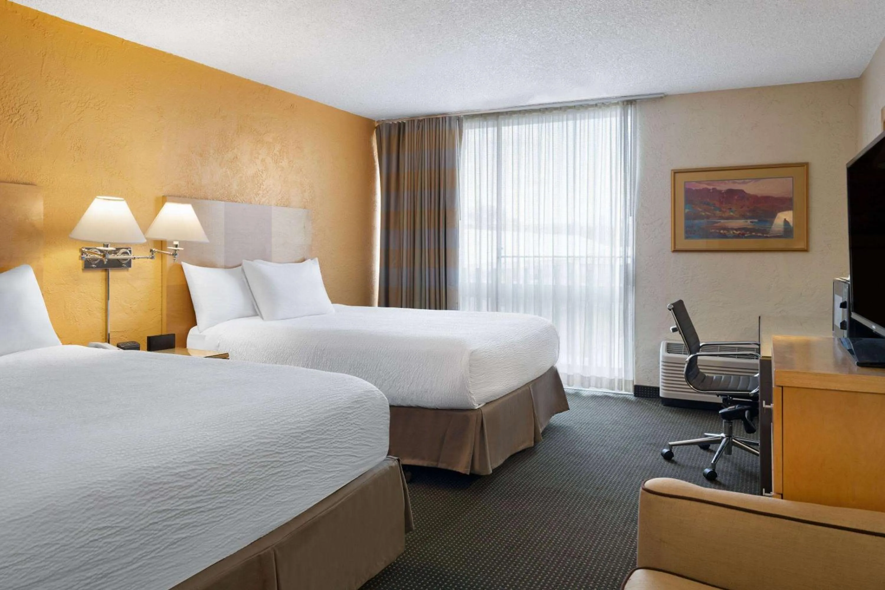 Photo of the whole room, Bed in Ramada by Wyndham Tucson