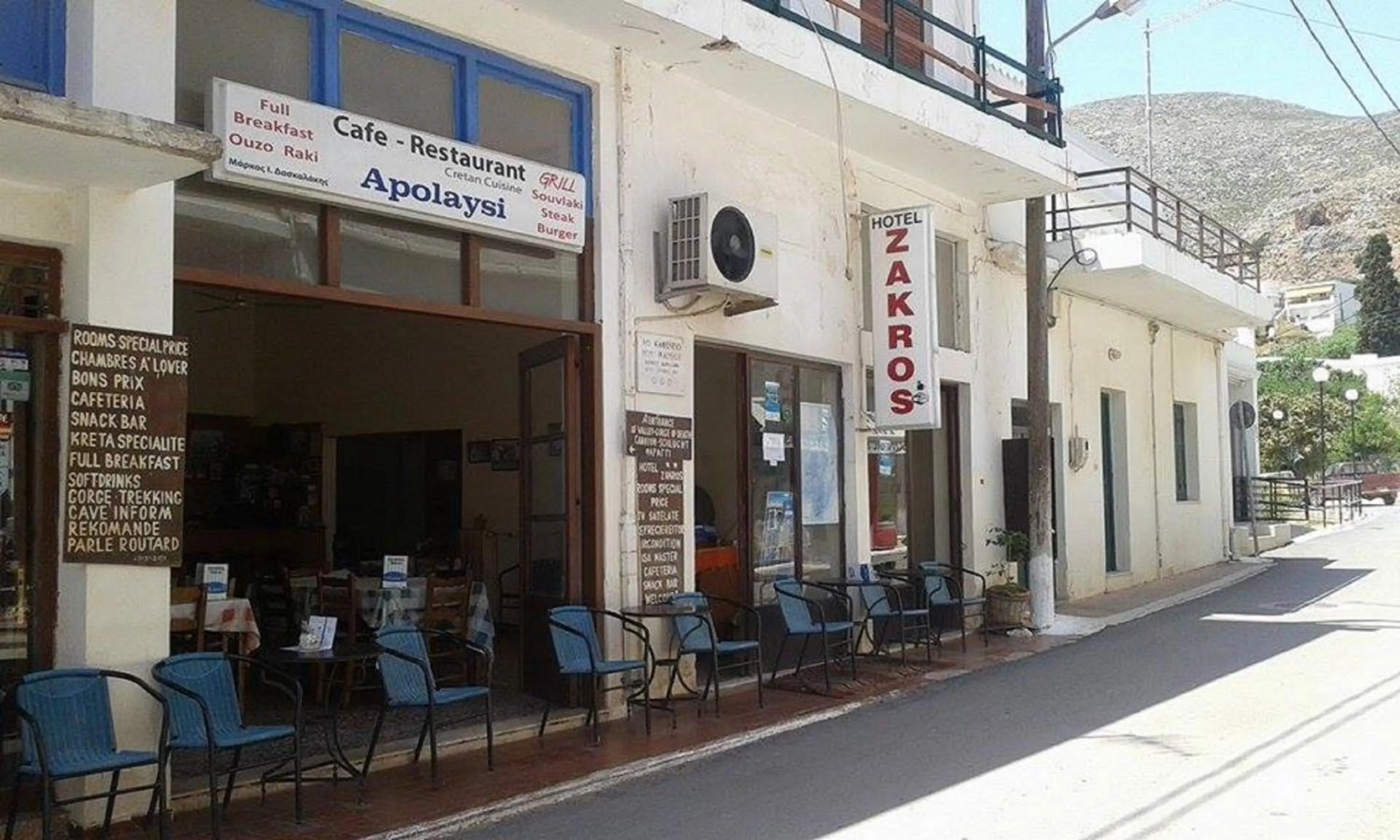 Property logo or sign in Hotel zakros rooms-restaurant