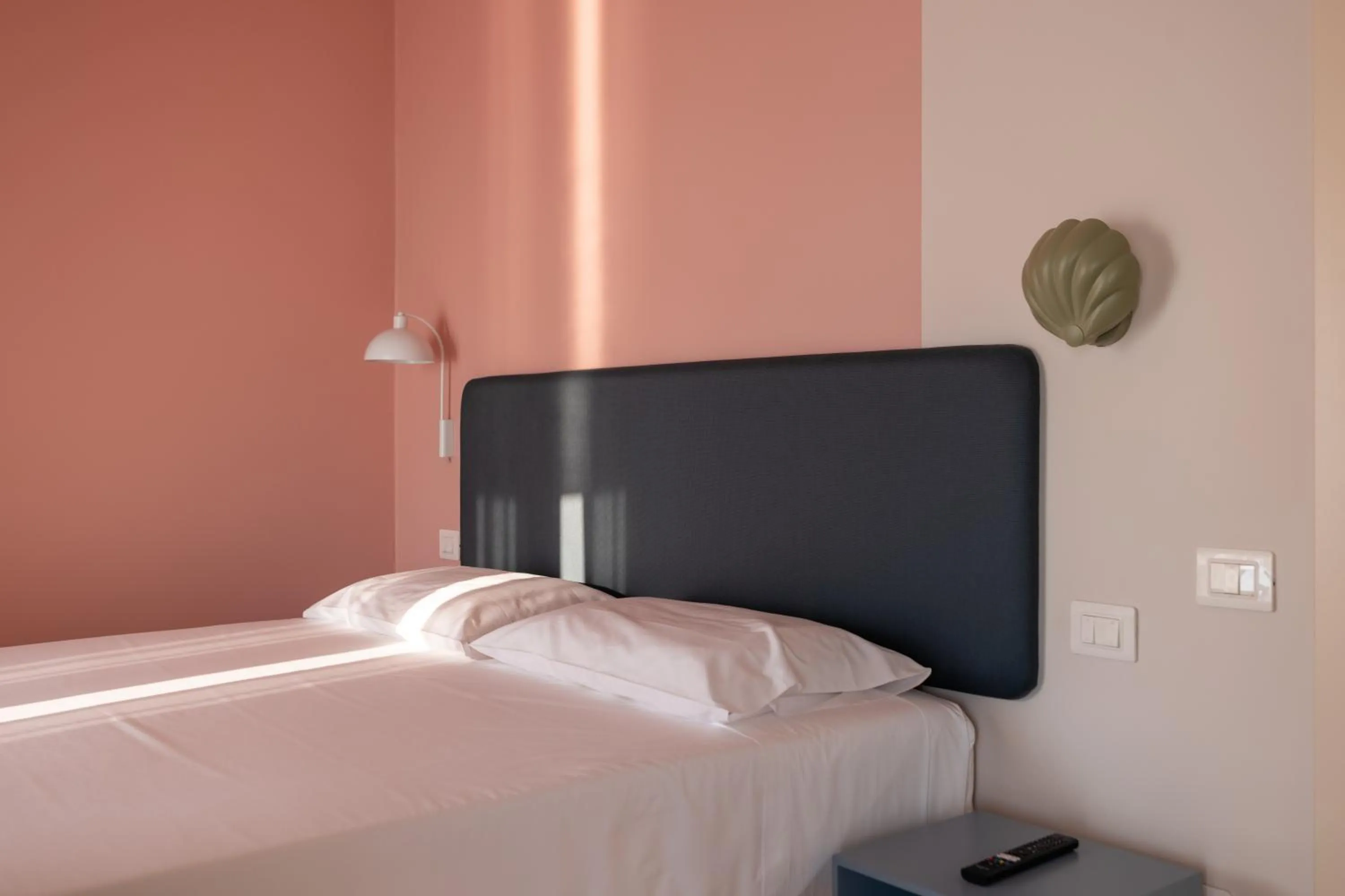 Bed in La Vista Postcard Hotel