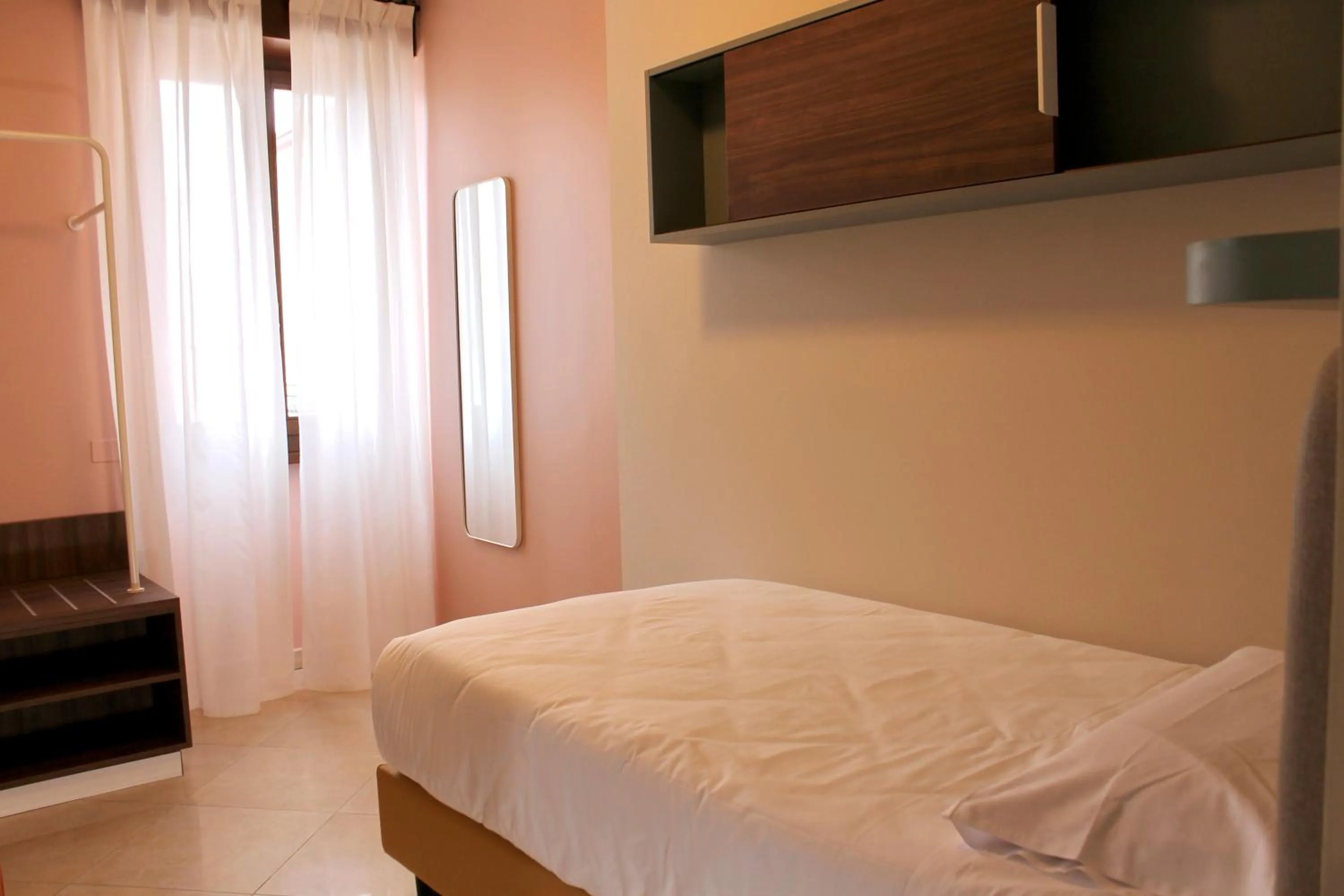 Bed in La Vista Postcard Hotel