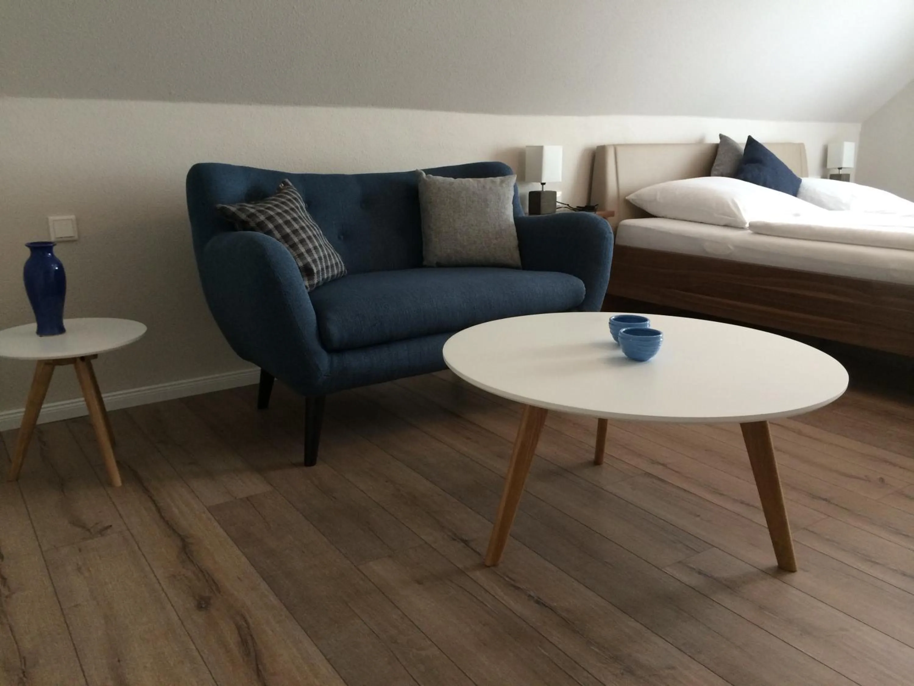 Seating area, Bed in Hotel Restaurant Am Kring