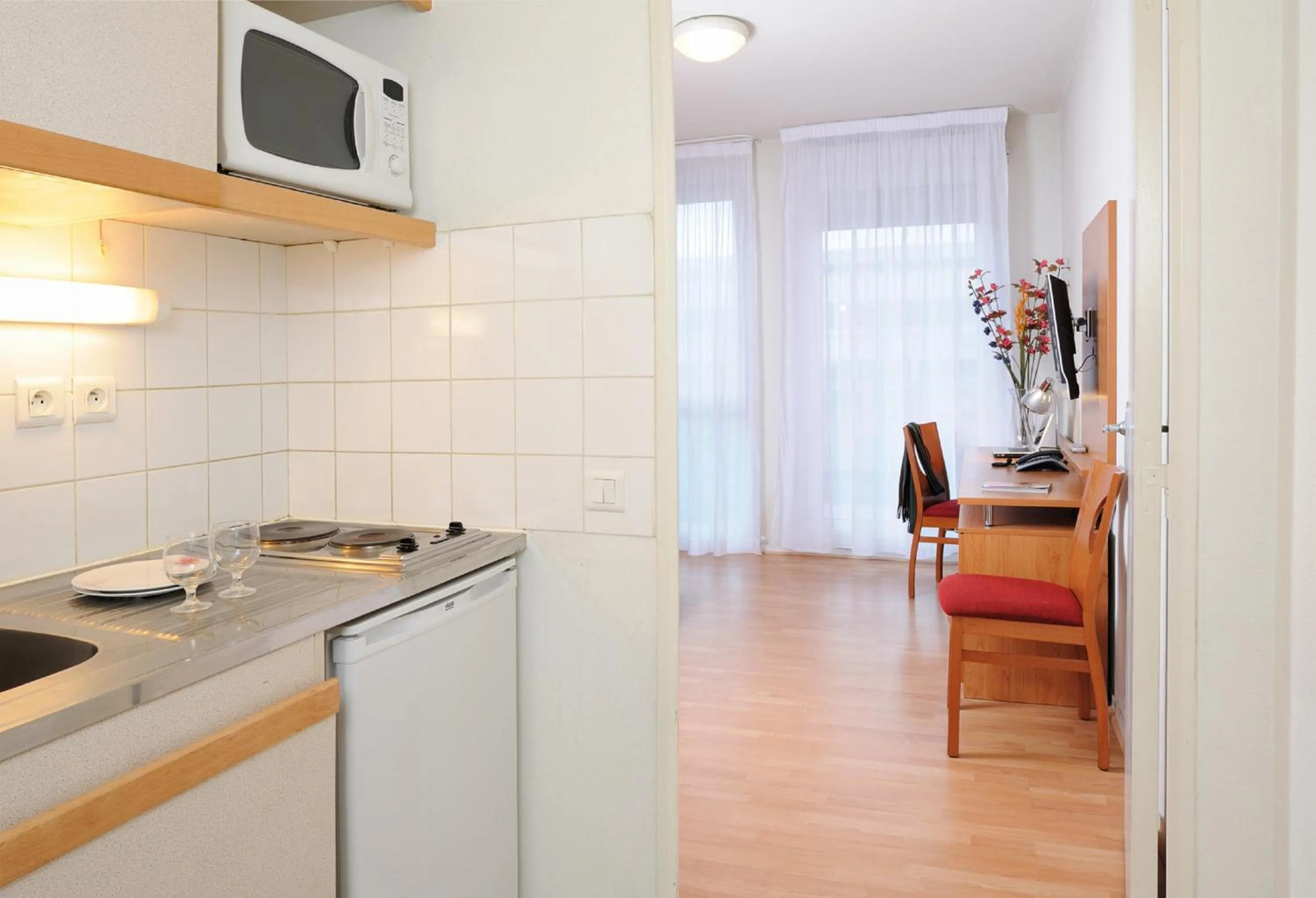 Kitchen or kitchenette in Séjours & Affaires Paris Ivry