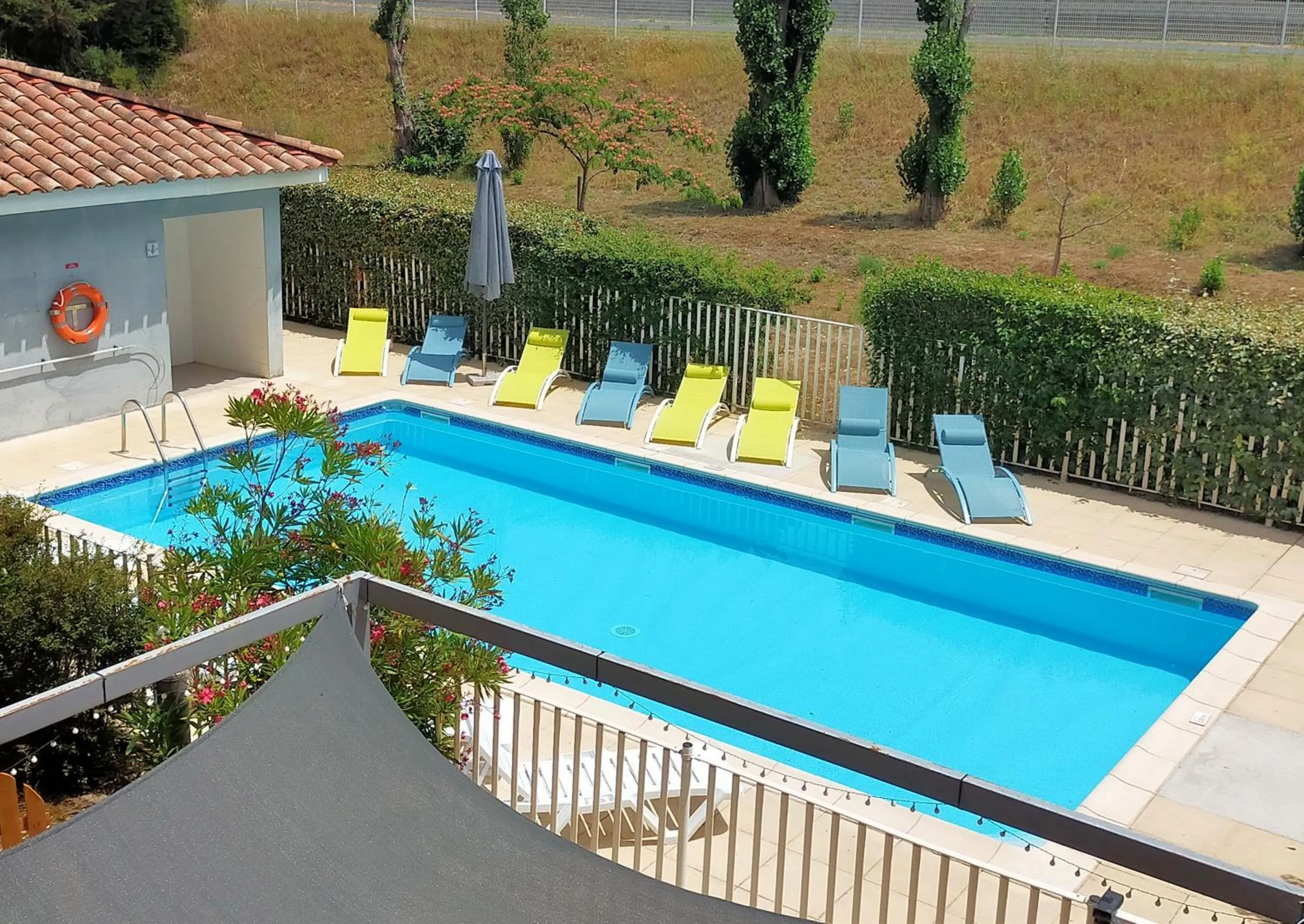 Swimming pool in Comfort Aparthotel Carcassonne