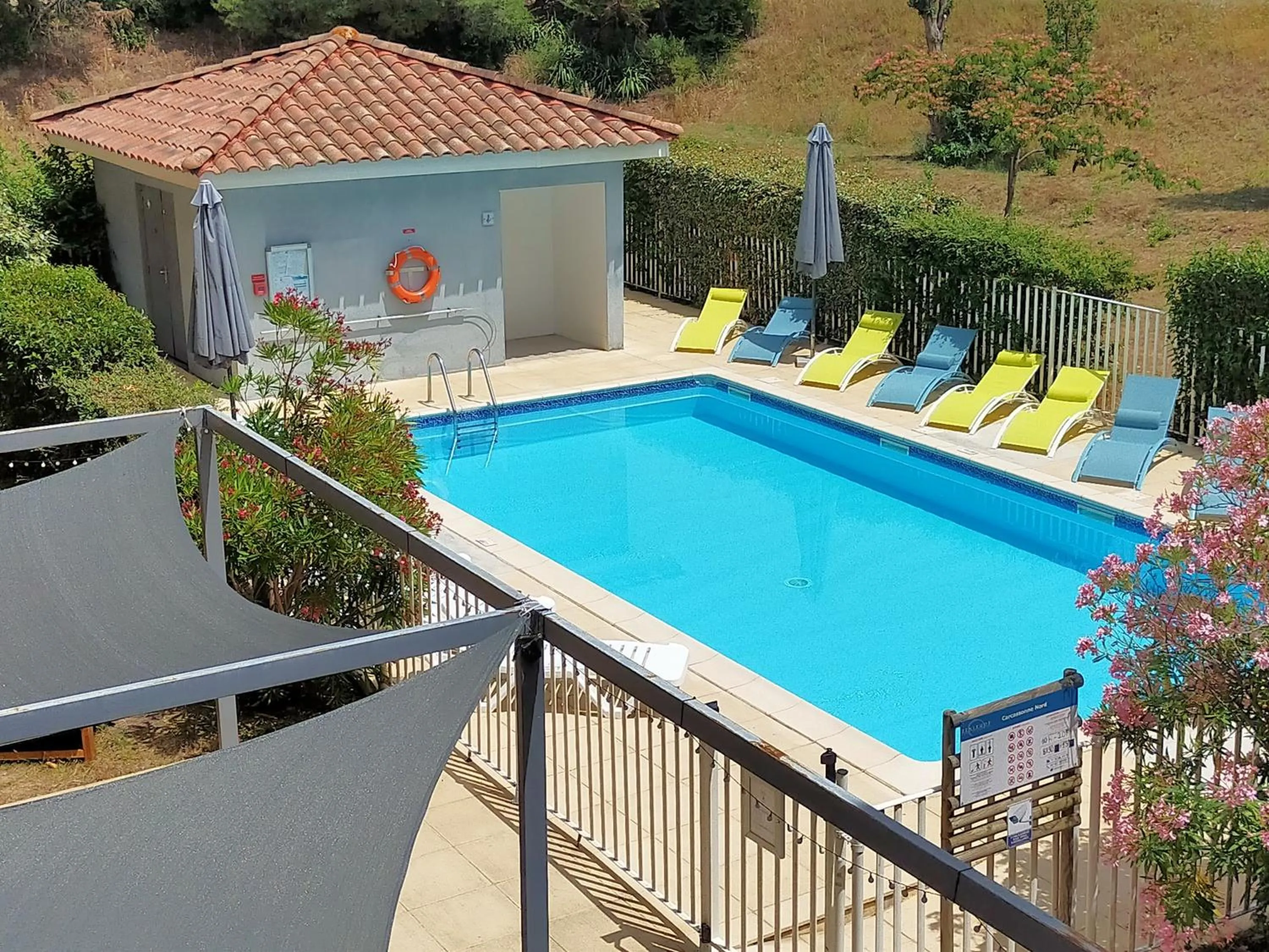 Swimming pool in Comfort Aparthotel Carcassonne