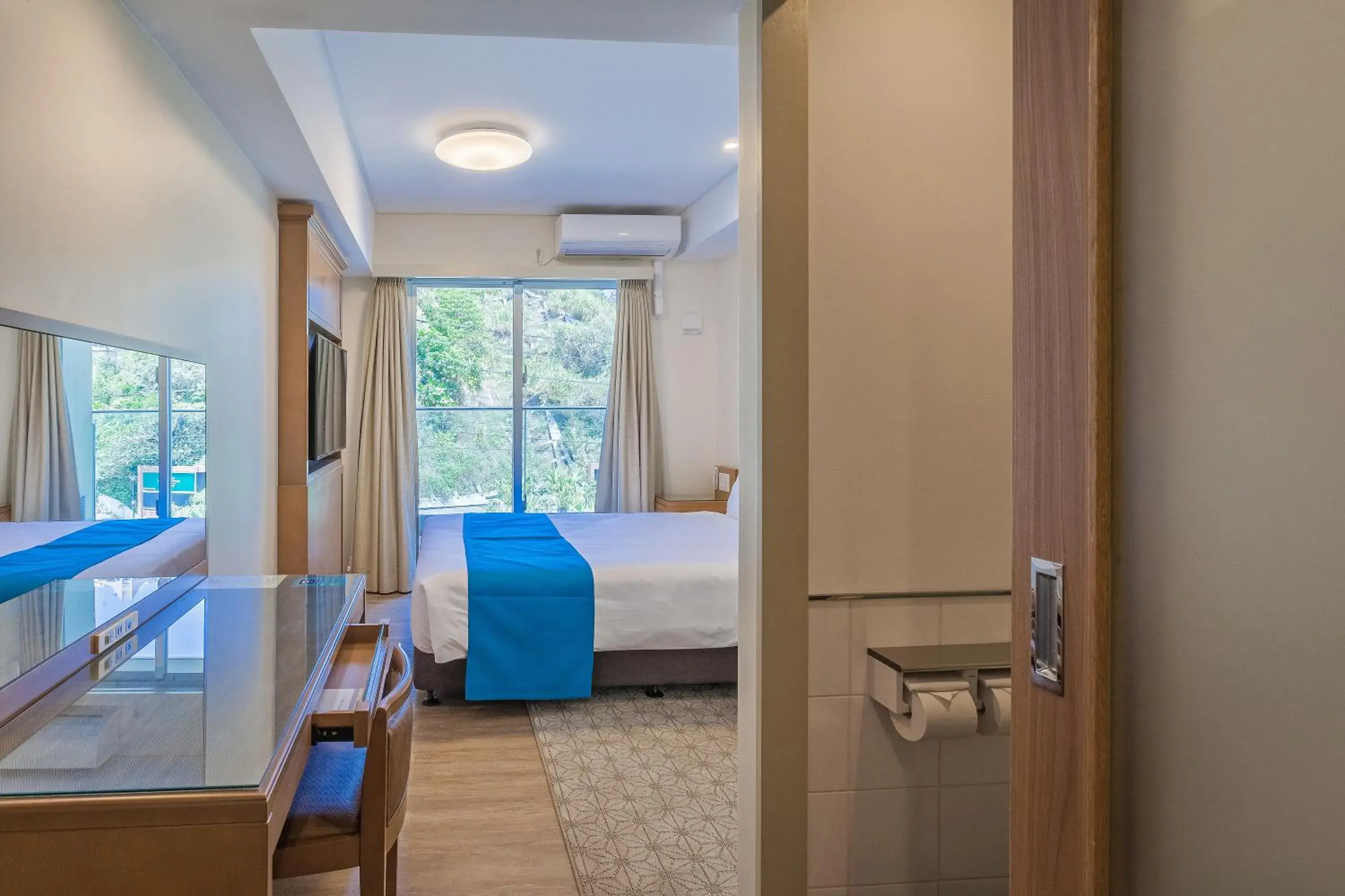 Queen Room - single occupancy in Kariyushi LCH. Resort Queen Room - single occupancy in Kariyushi LCH. Resort