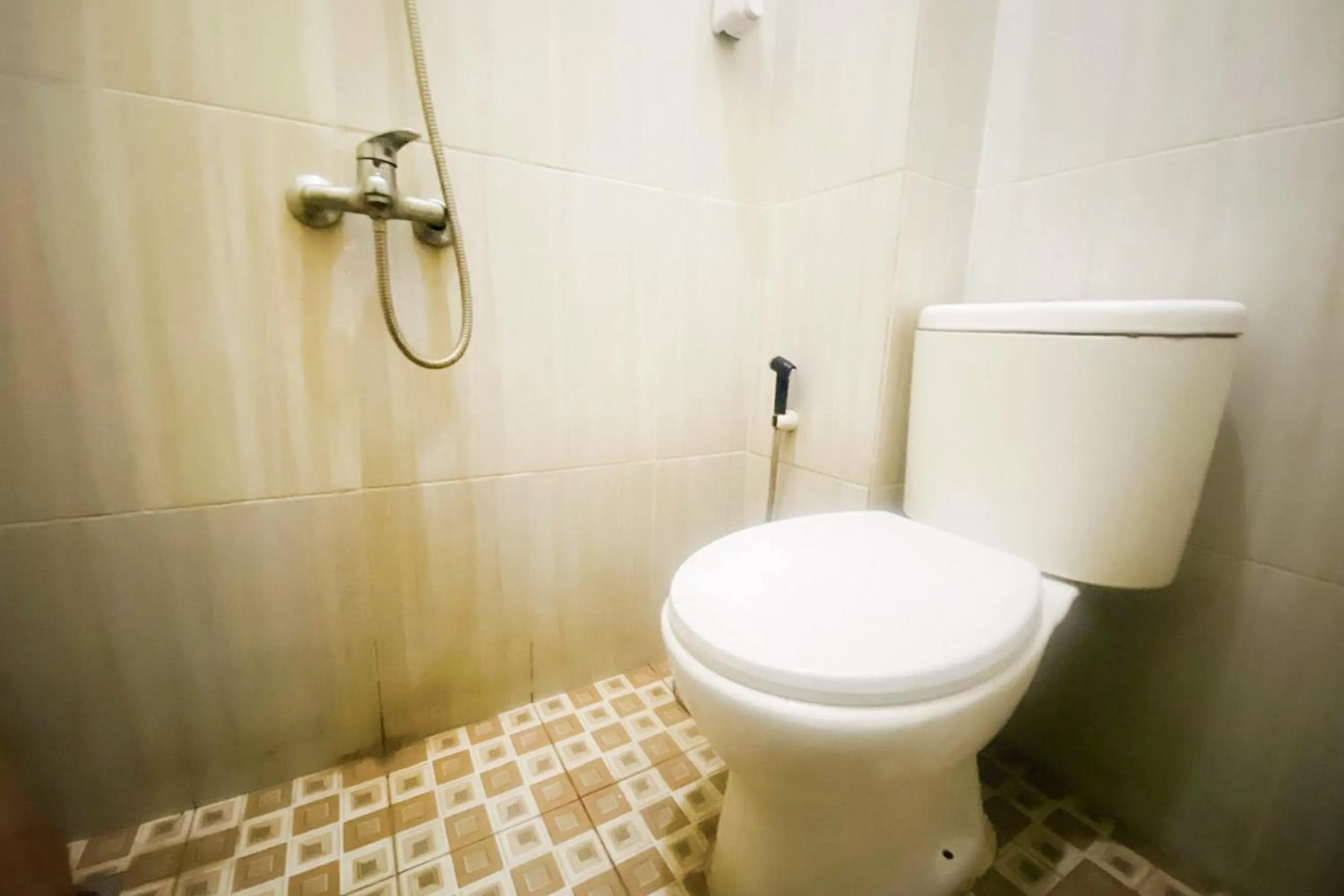 Bathroom in RedDoorz Syariah at Diva Residen Kasturi 1