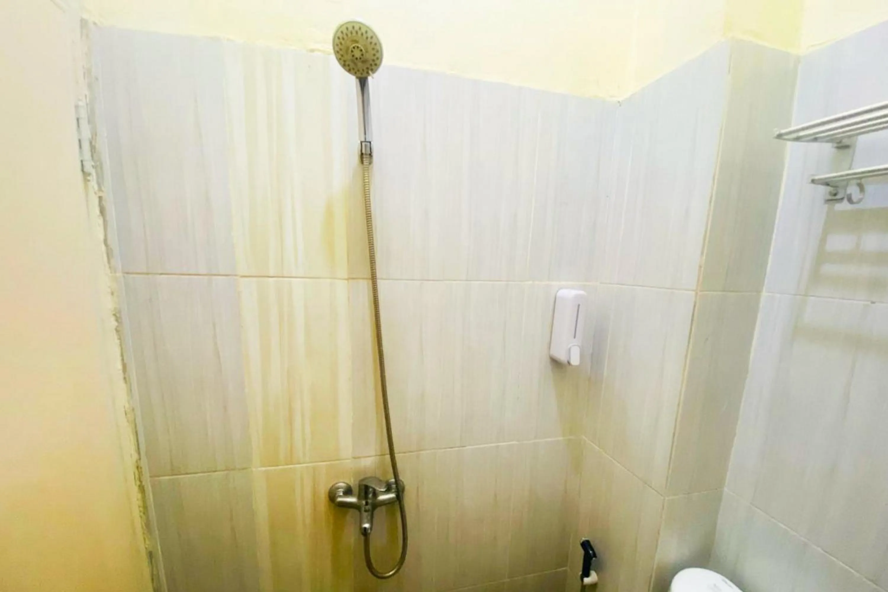 Bathroom in RedDoorz Syariah at Diva Residen Kasturi 1