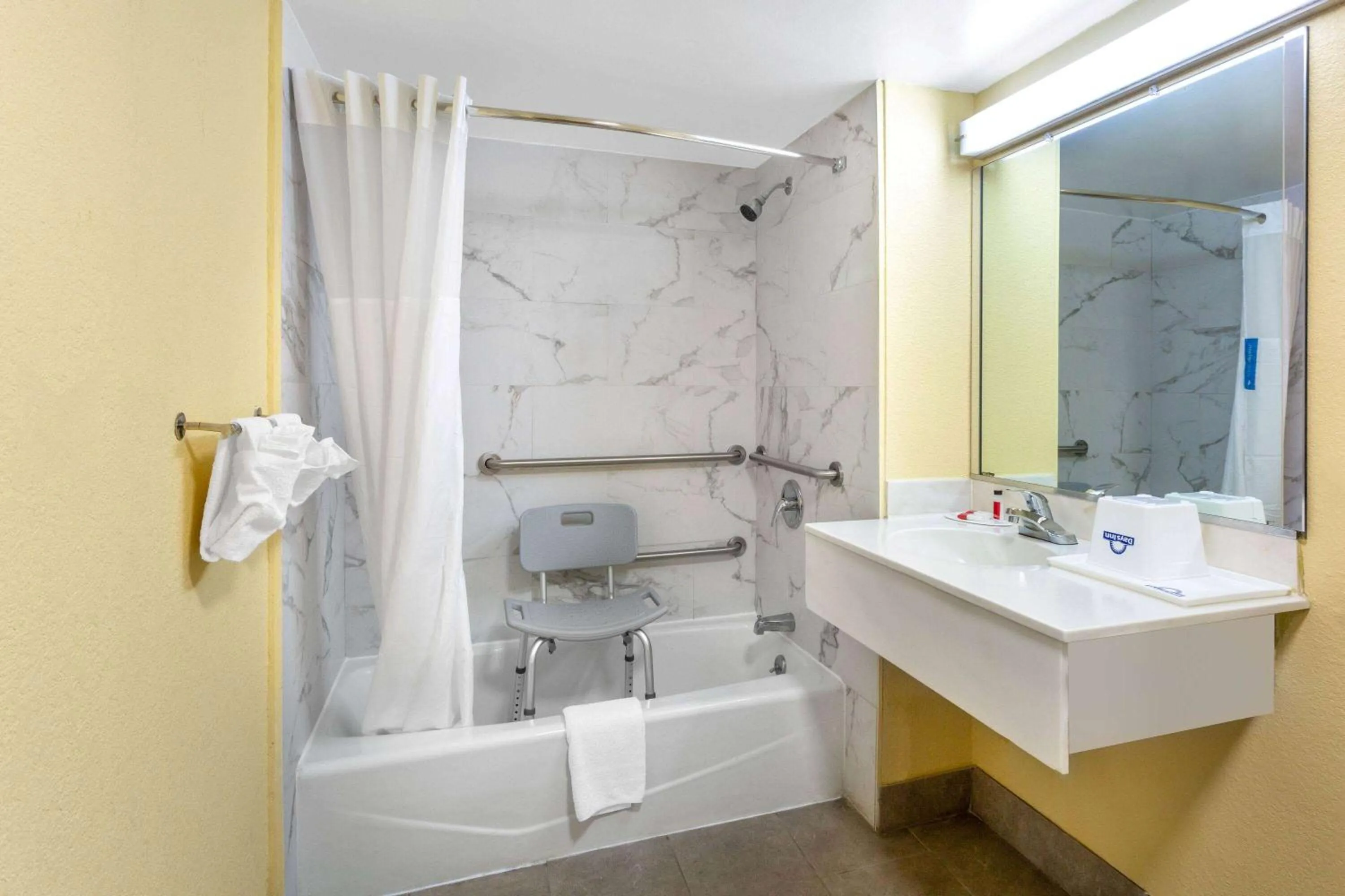 Bathroom in Days Inn by Wyndham Hampton Near Coliseum Convention Center