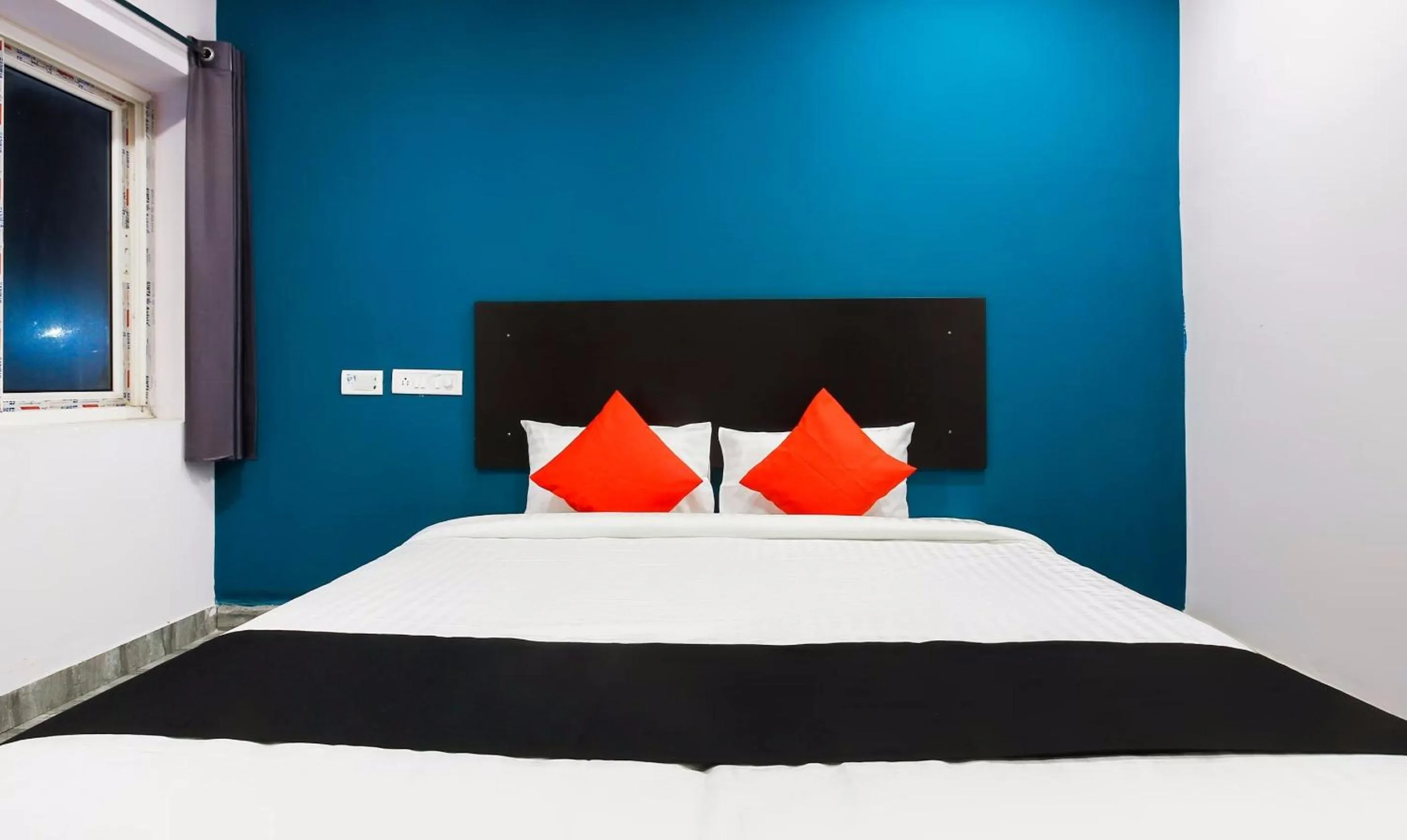 Bedroom, Bed in Capital O Che Sigma Hotel