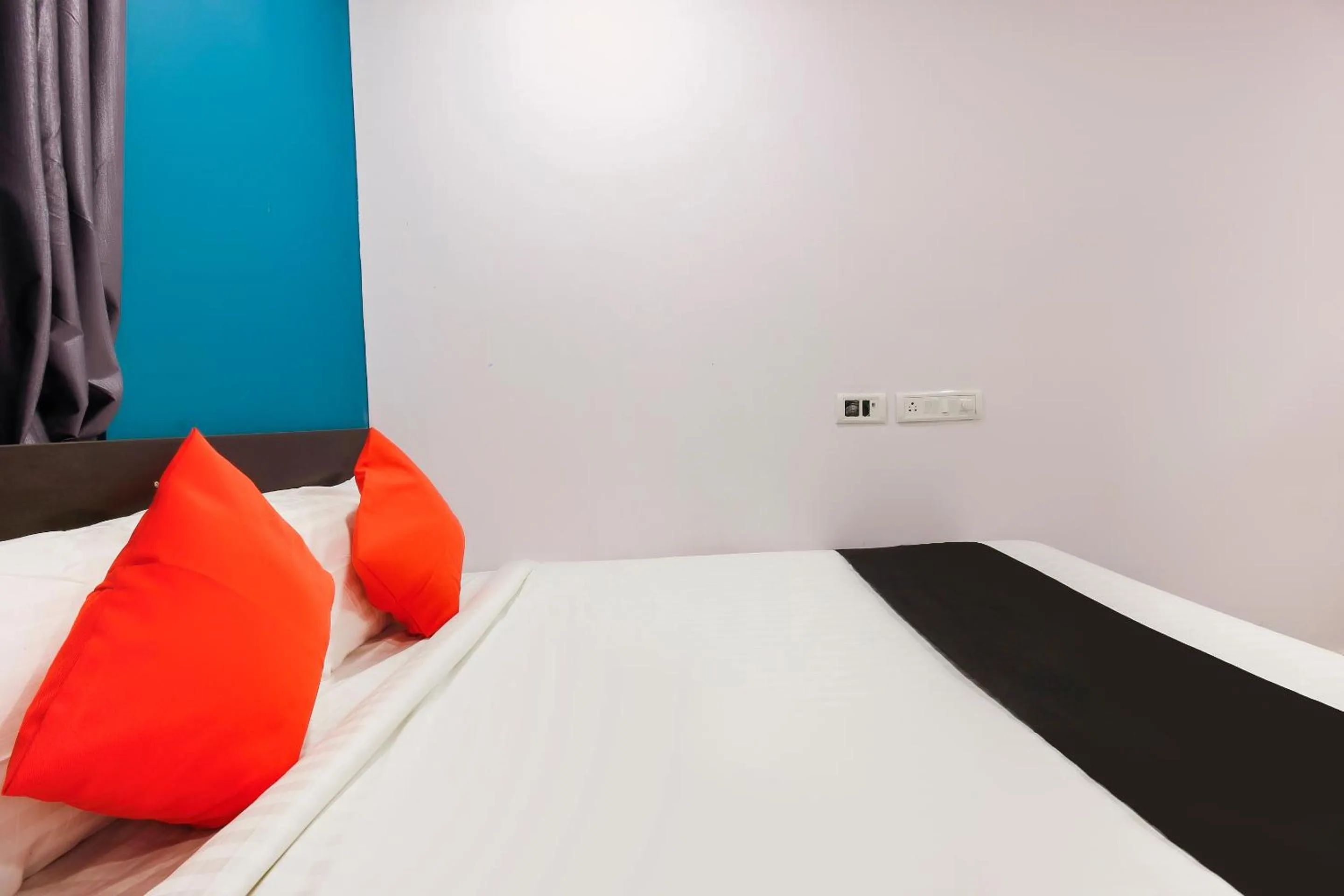 Bedroom, Bed in Capital O Che Sigma Hotel