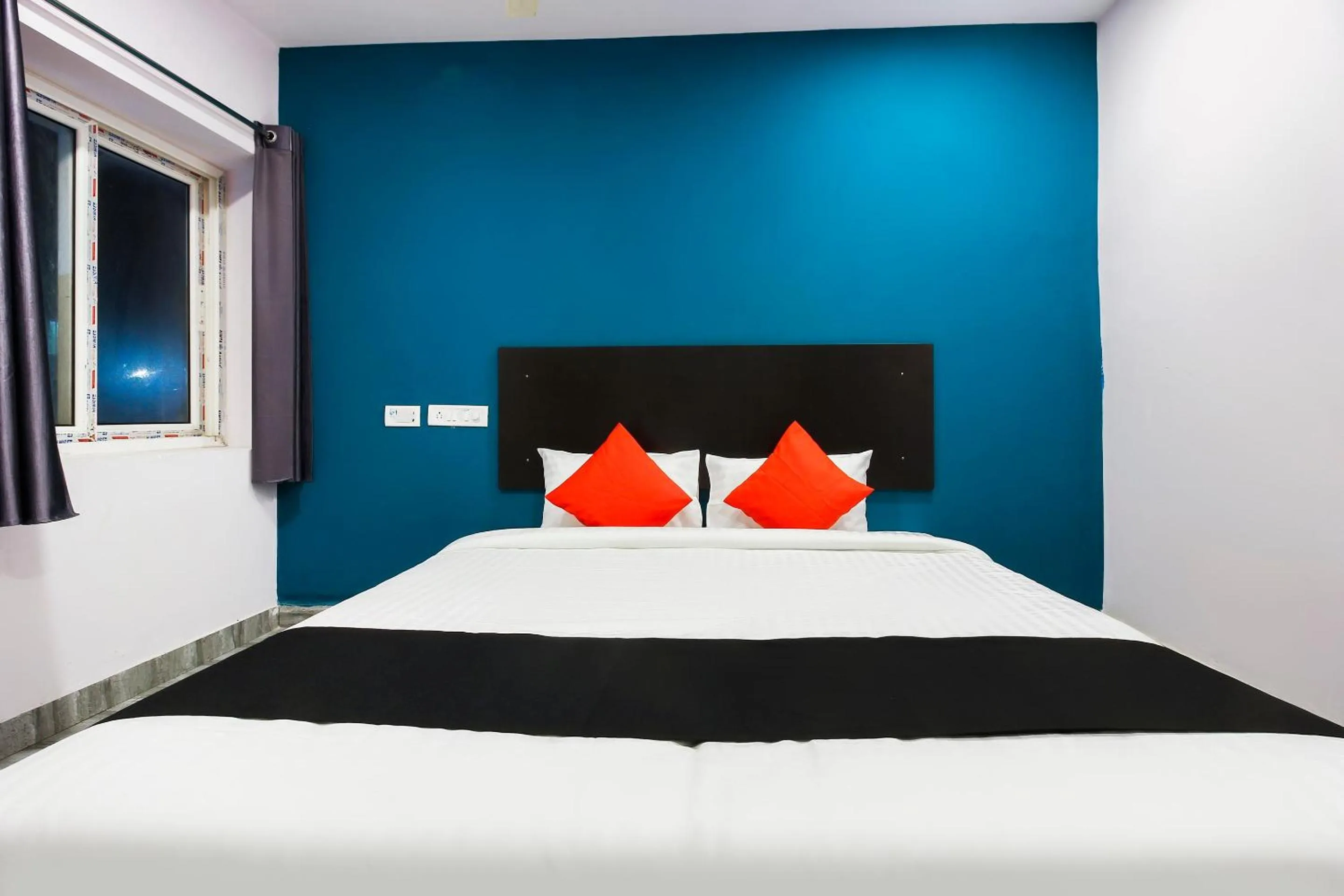 Bedroom, Bed in Capital O Che Sigma Hotel