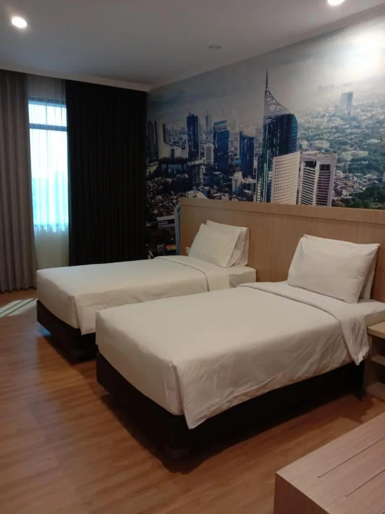 Bed in Sanno Pluit Hotel