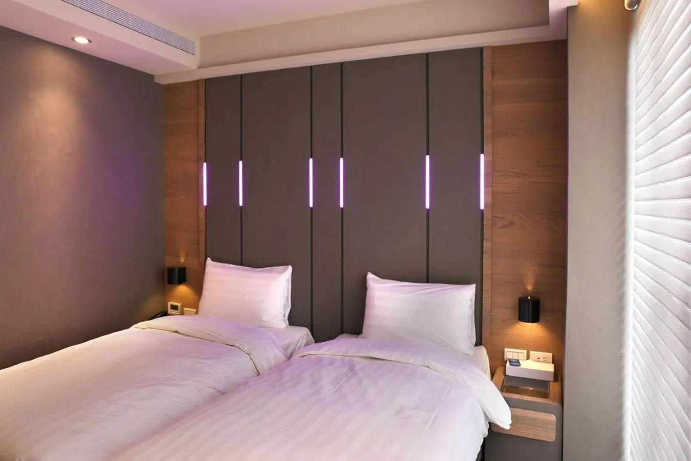 Bed in KIWI SHARE HOTEL ZHONGLI