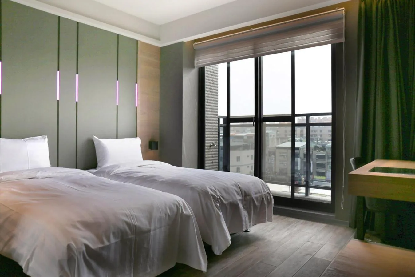 Bed in KIWI SHARE HOTEL ZHONGLI