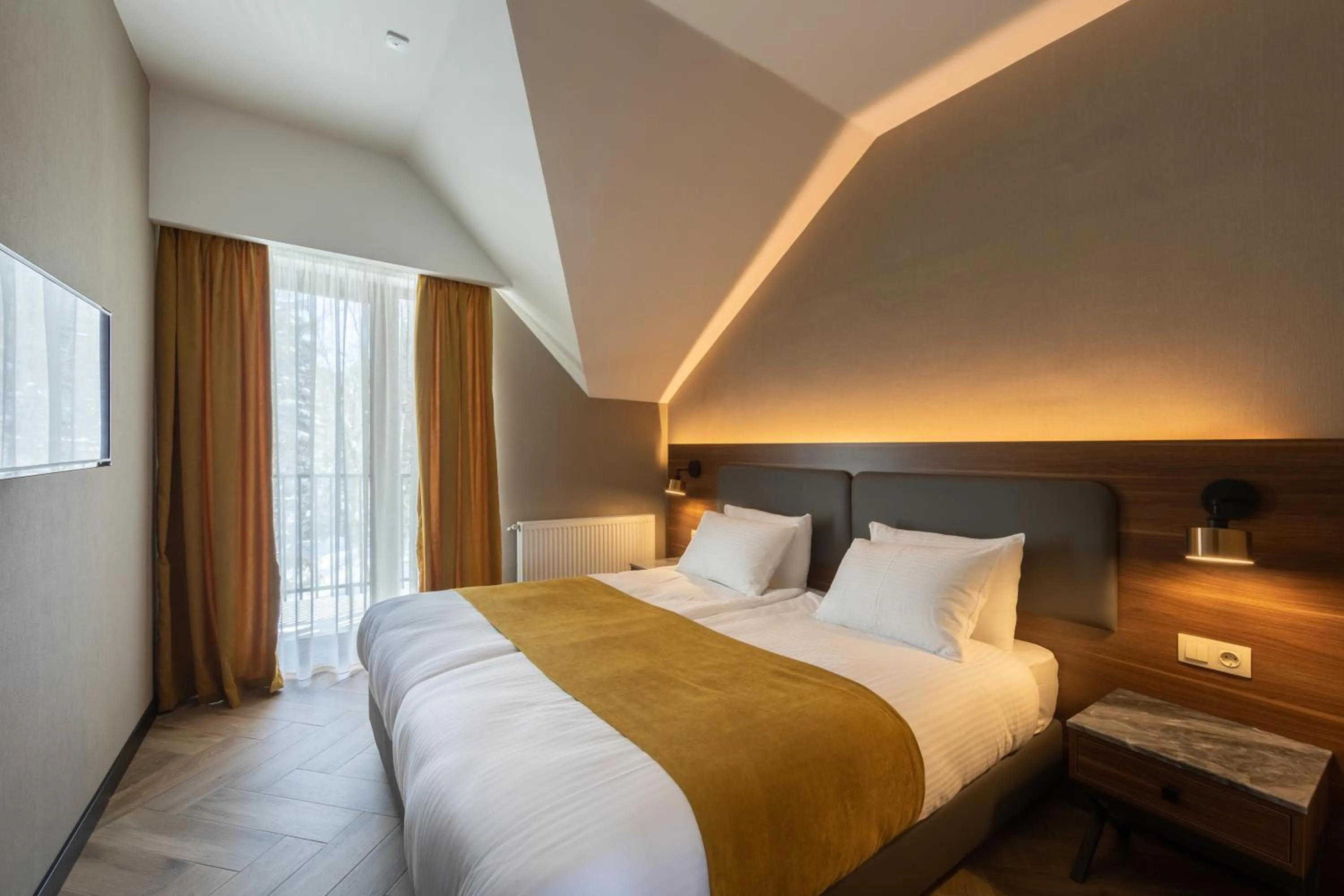 Bed in KOMOREBI BAKURIANI RESORT