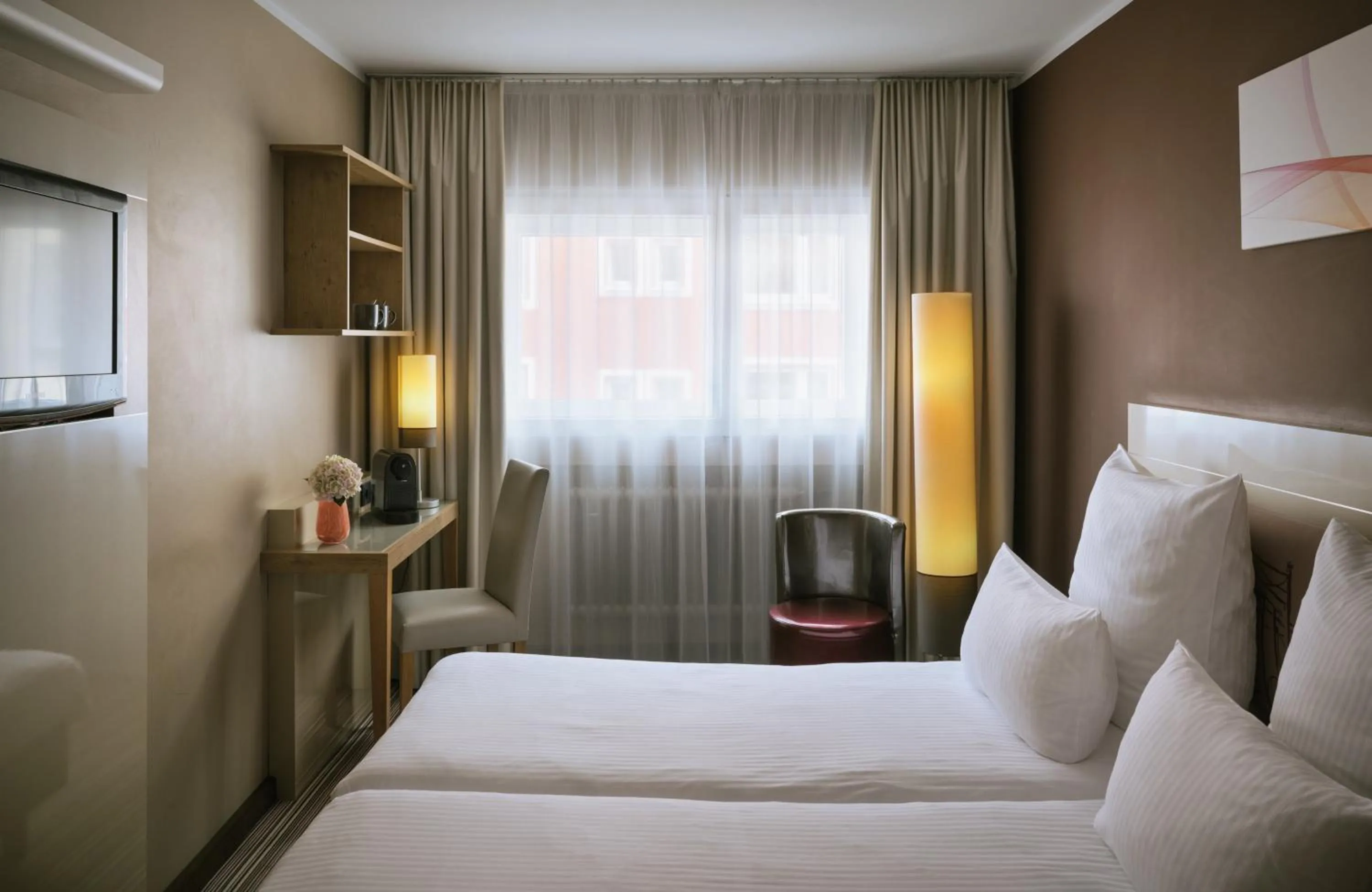 Photo of the whole room, Bed in Leonardo Boutique Hotel Munich