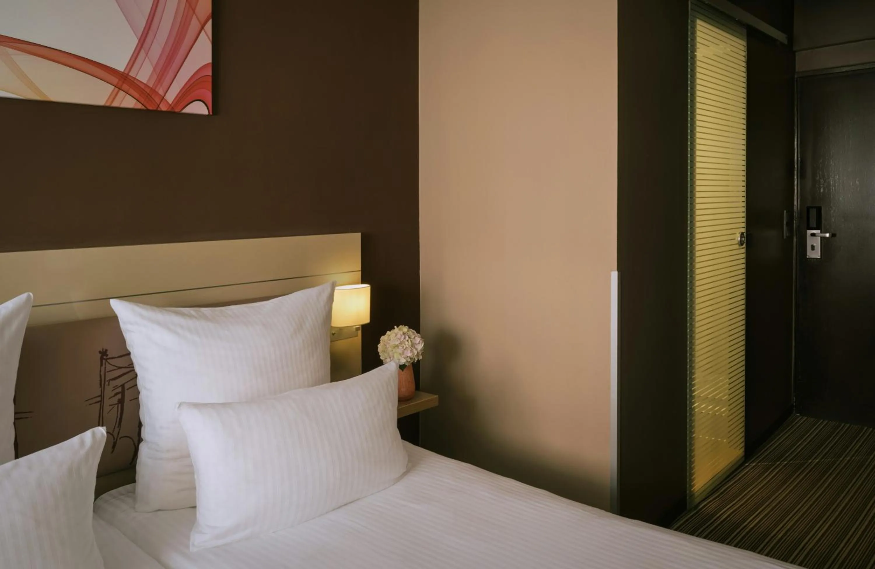 Photo of the whole room, Bed in Leonardo Boutique Hotel Munich