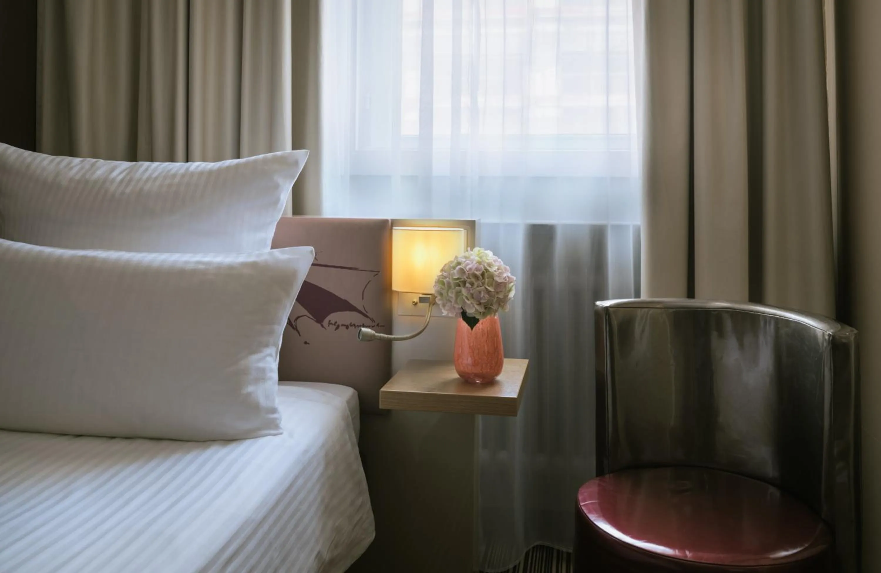 Photo of the whole room, Bed in Leonardo Boutique Hotel Munich