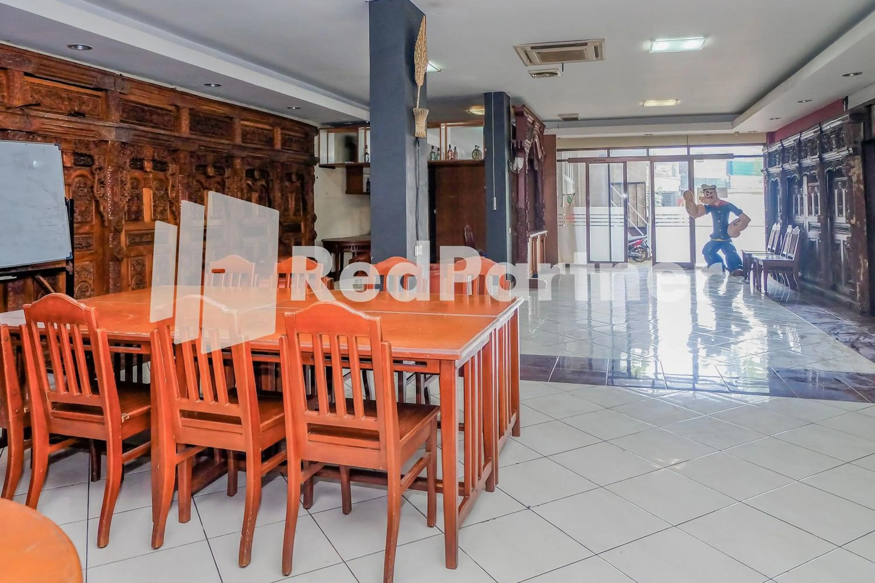 Restaurant/places to eat in Hotel Sebelas at Jalan Palasari Mitra RedDoorz