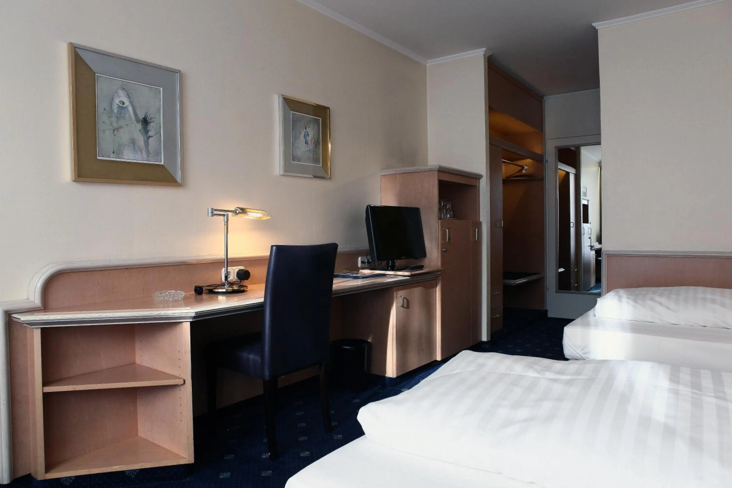 Seating area, Bed in Hotel Ambiente Garni