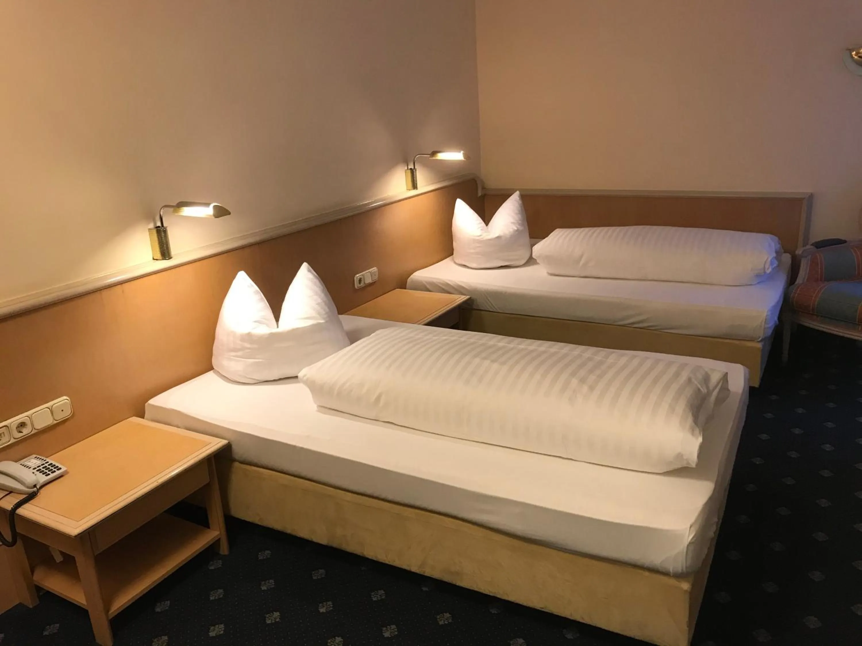 Bed in Hotel Ambiente Garni